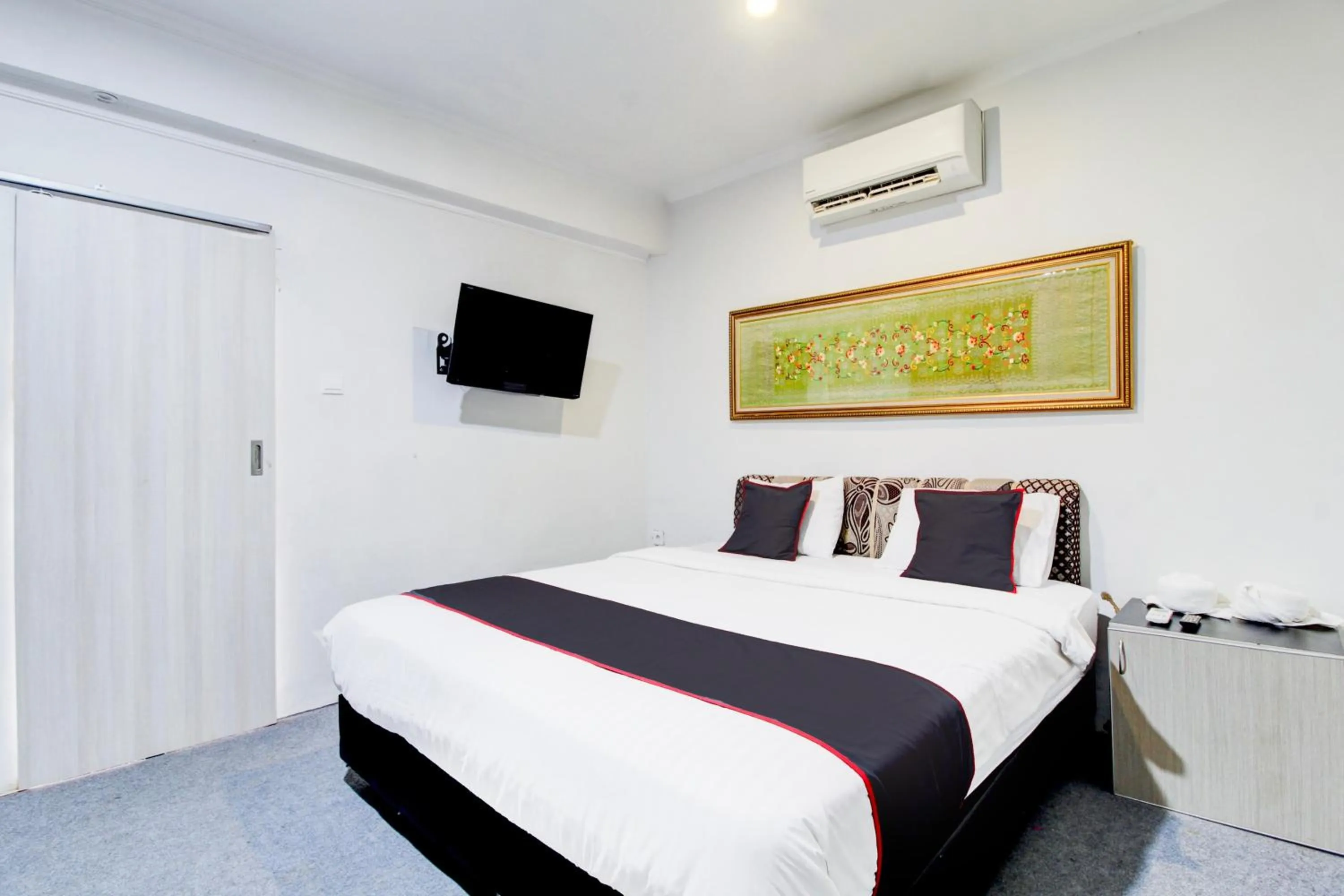 Bedroom, Bed in Hotel O Jalan Jenderal Sudirman Near Imam Bonjol Square Formerly Nelvi Guest House