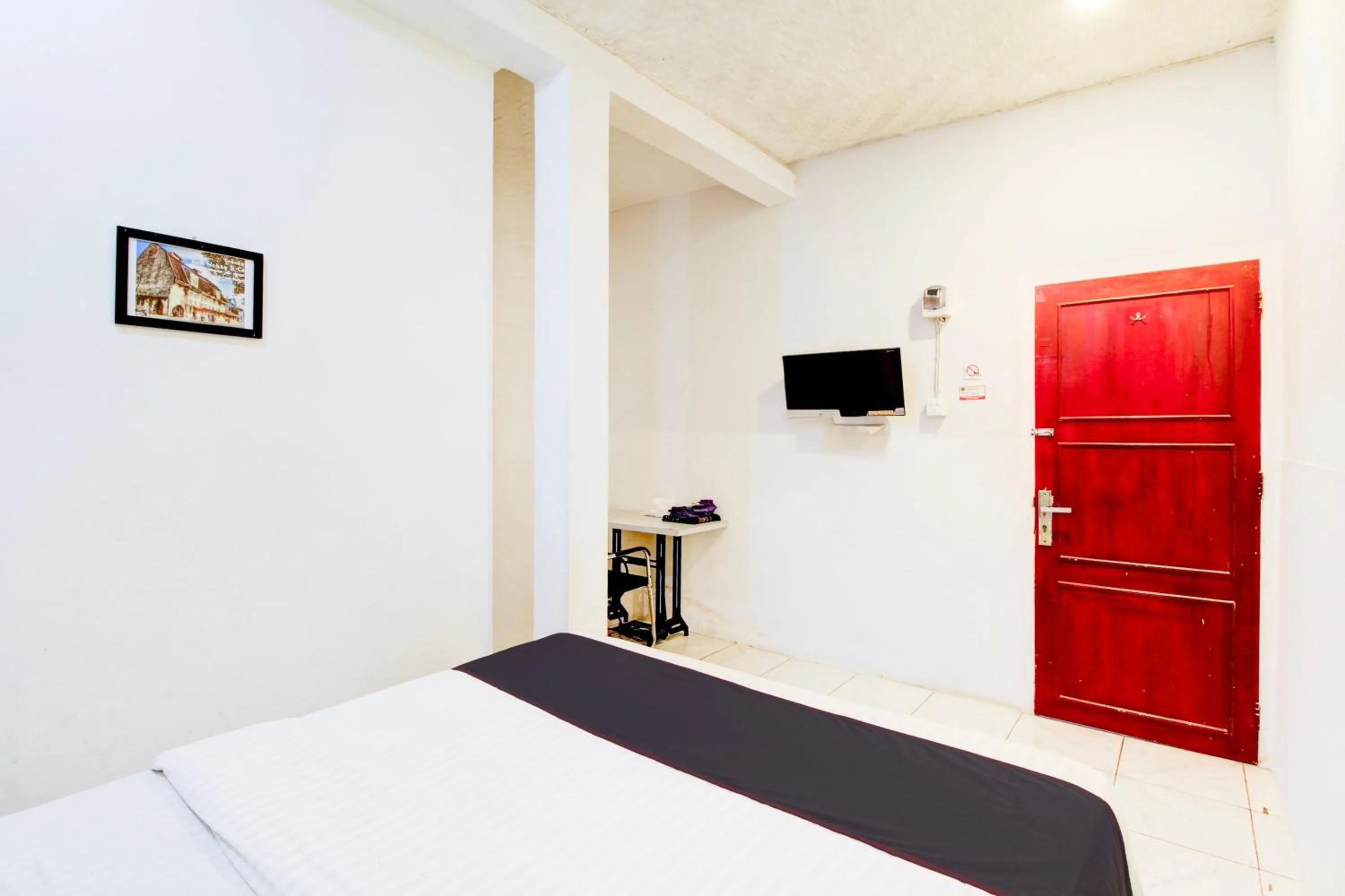 Bedroom, Bed in Hotel O Jalan Jenderal Sudirman Near Imam Bonjol Square Formerly Nelvi Guest House