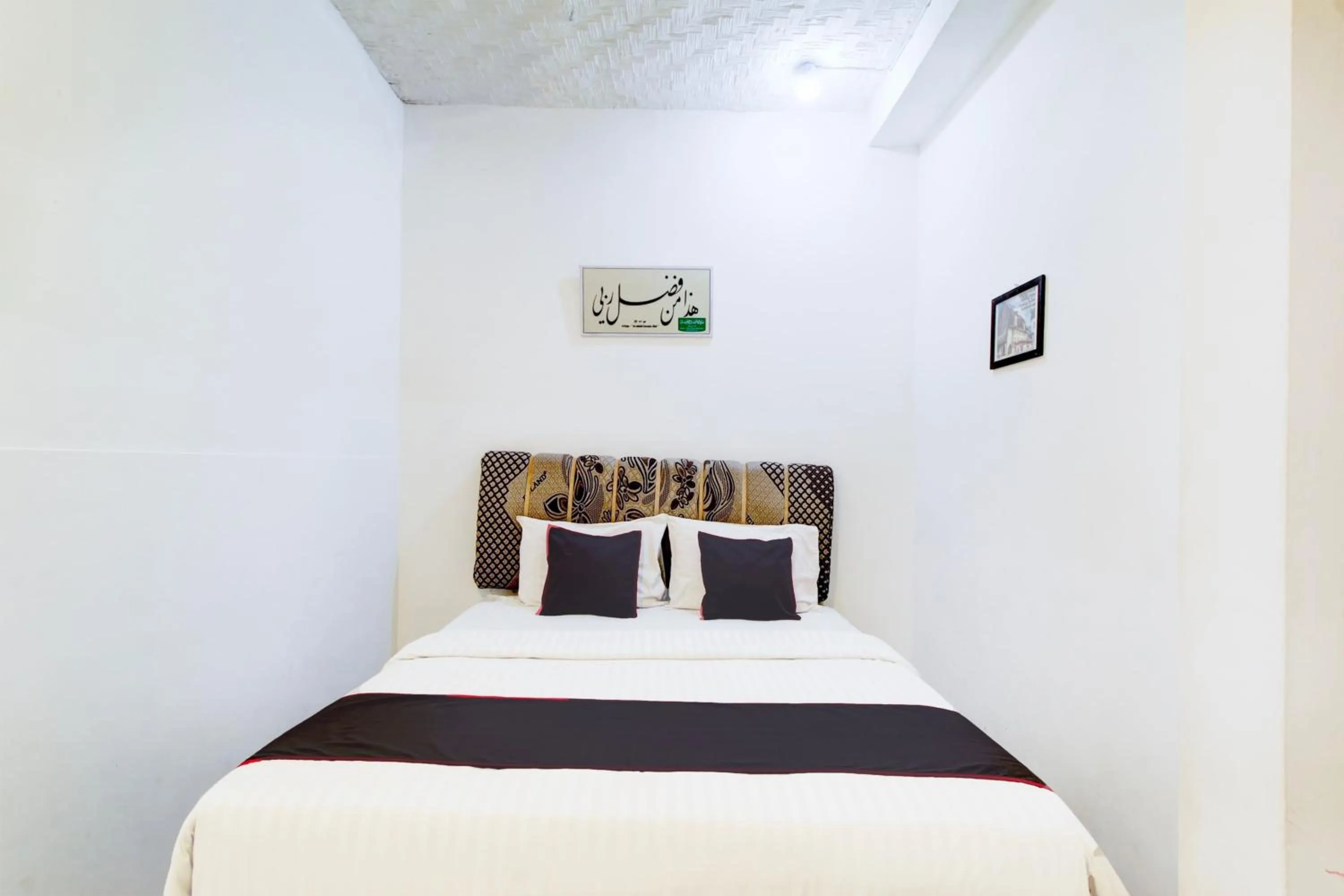 Bedroom, Bed in Hotel O Jalan Jenderal Sudirman Near Imam Bonjol Square Formerly Nelvi Guest House
