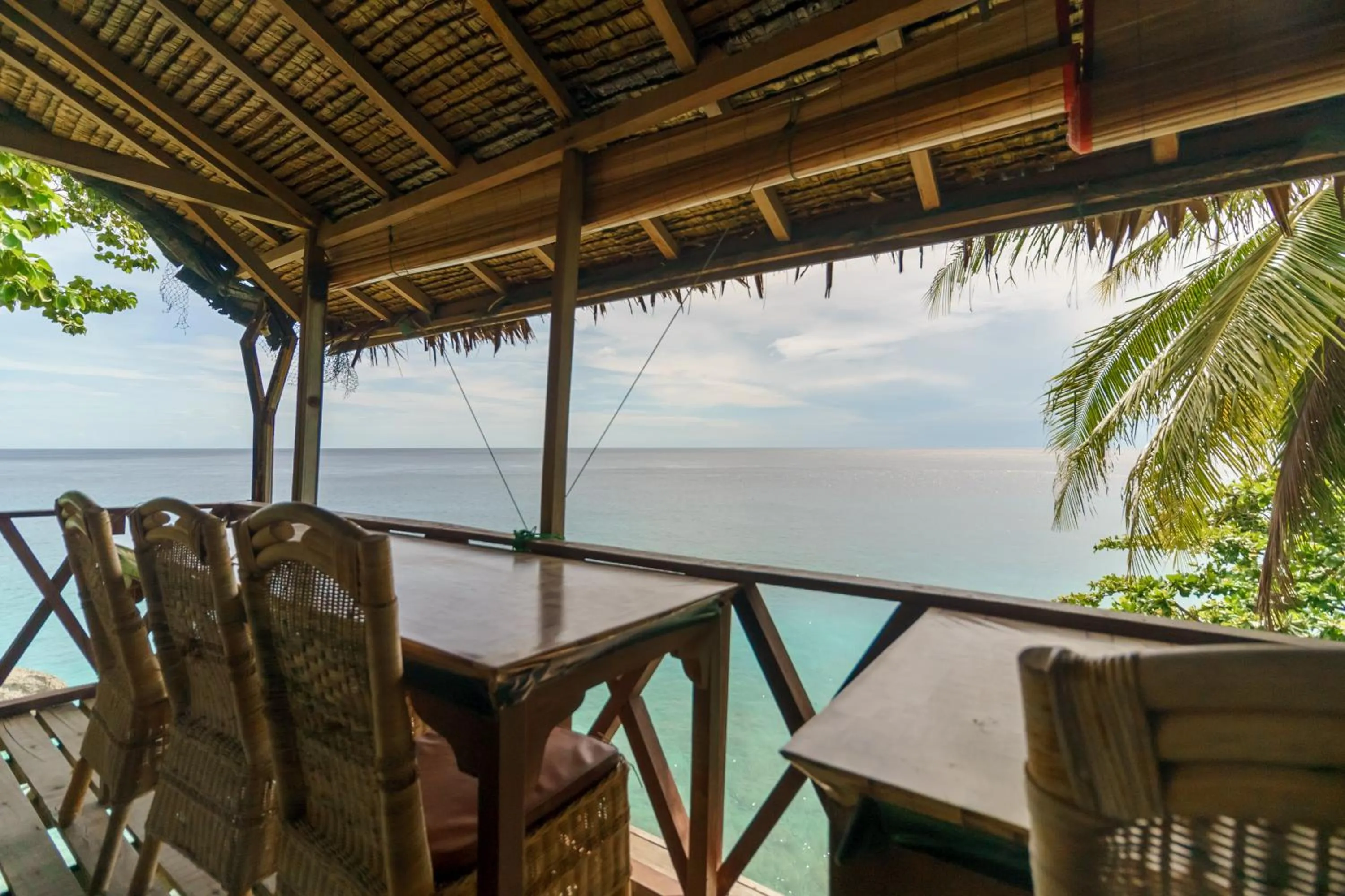 Balcony/Terrace in RedDoorz Syariah at Sumur Tiga Beach Sabang Aceh