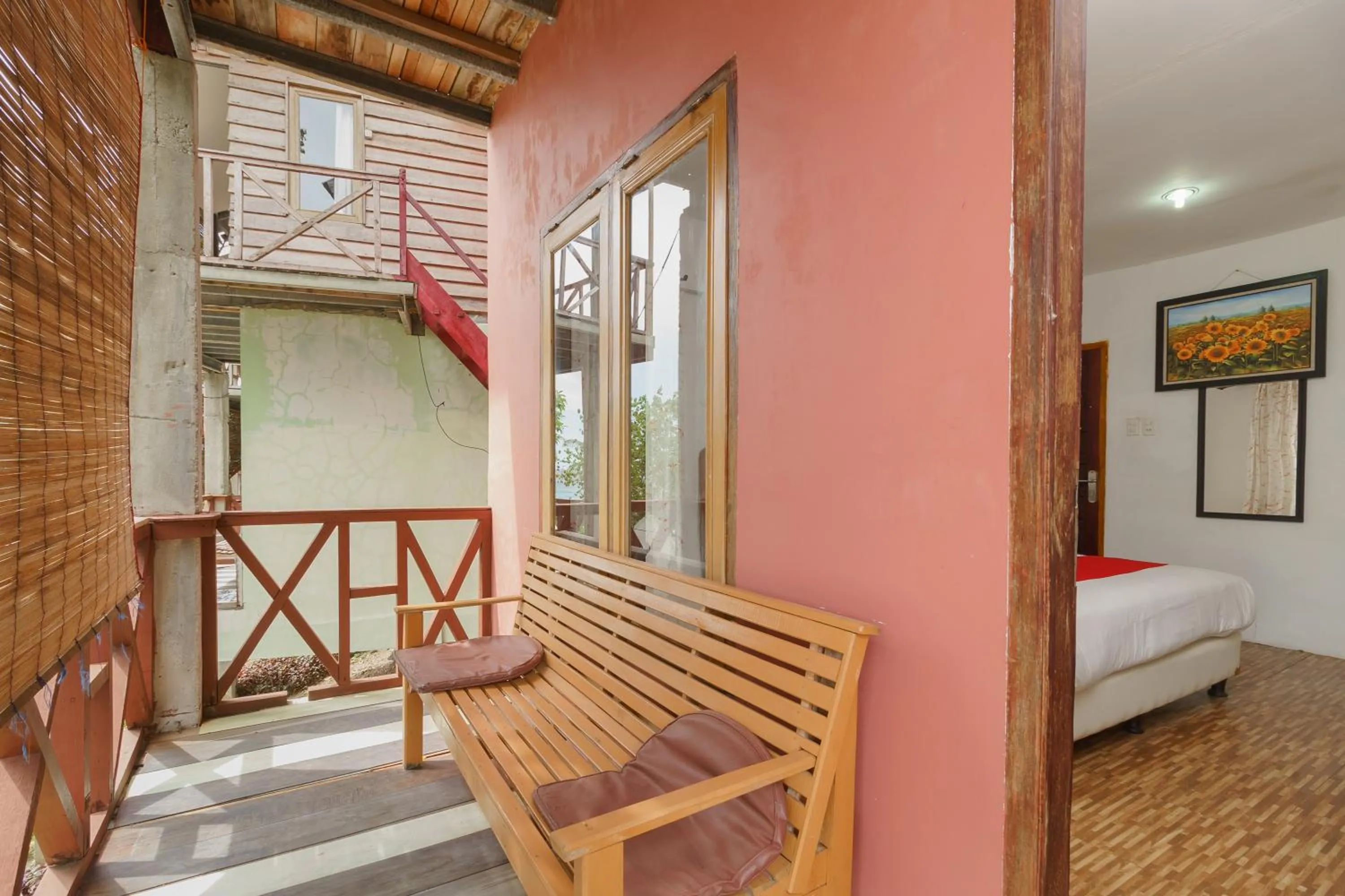 Facade/entrance, Bed in RedDoorz Syariah at Sumur Tiga Beach Sabang Aceh