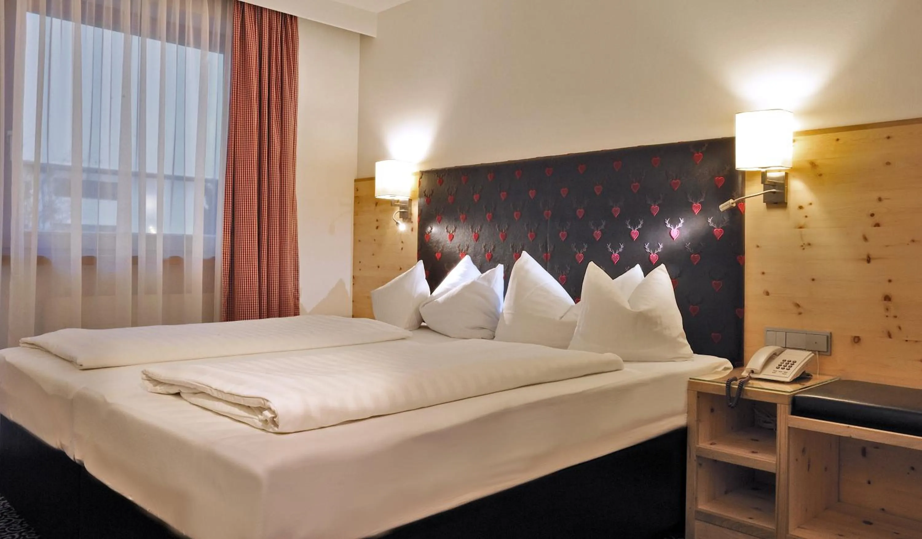 Bed in Hotel Tipotsch