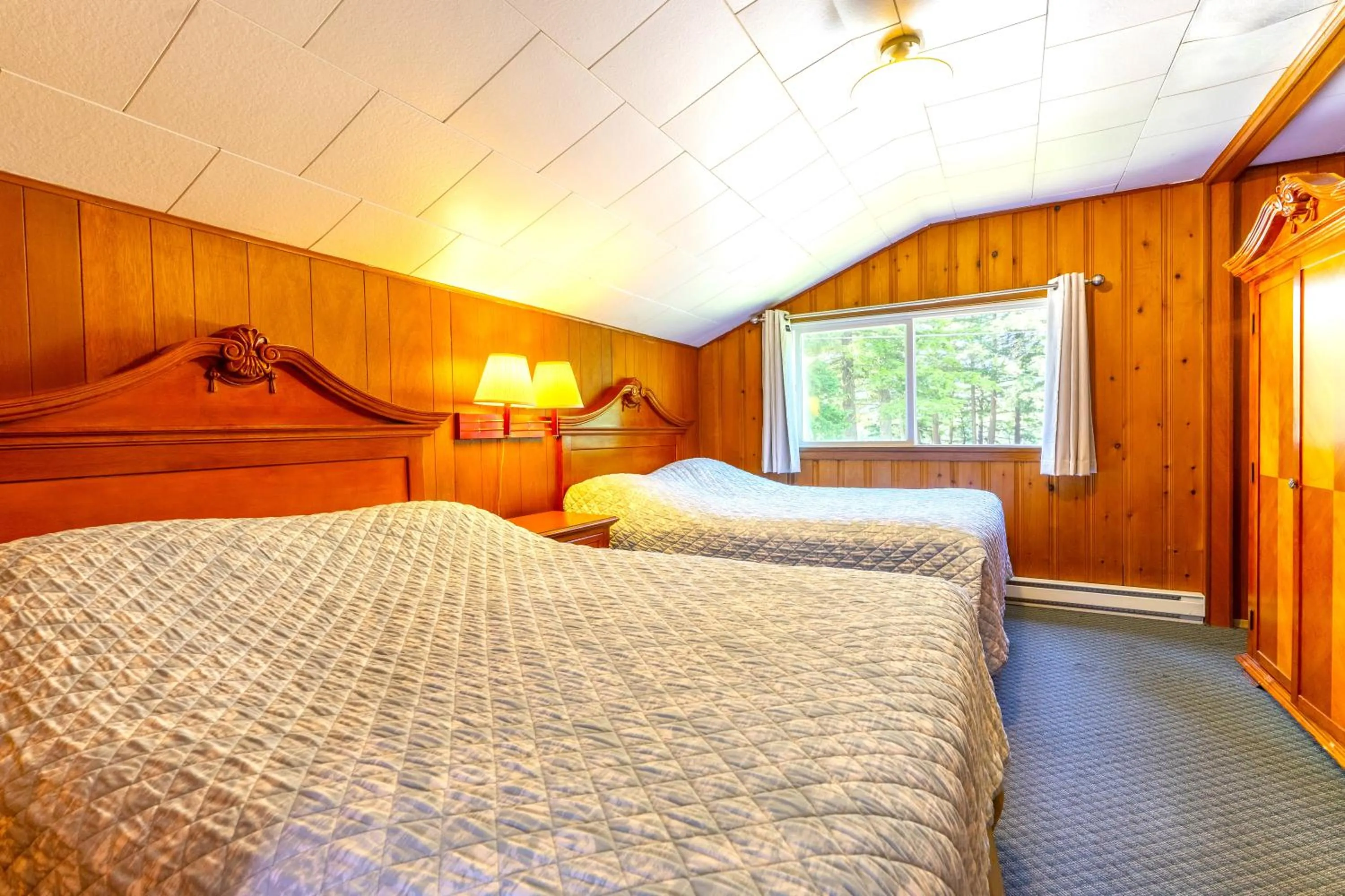 Bed in Richca Chalets Resort