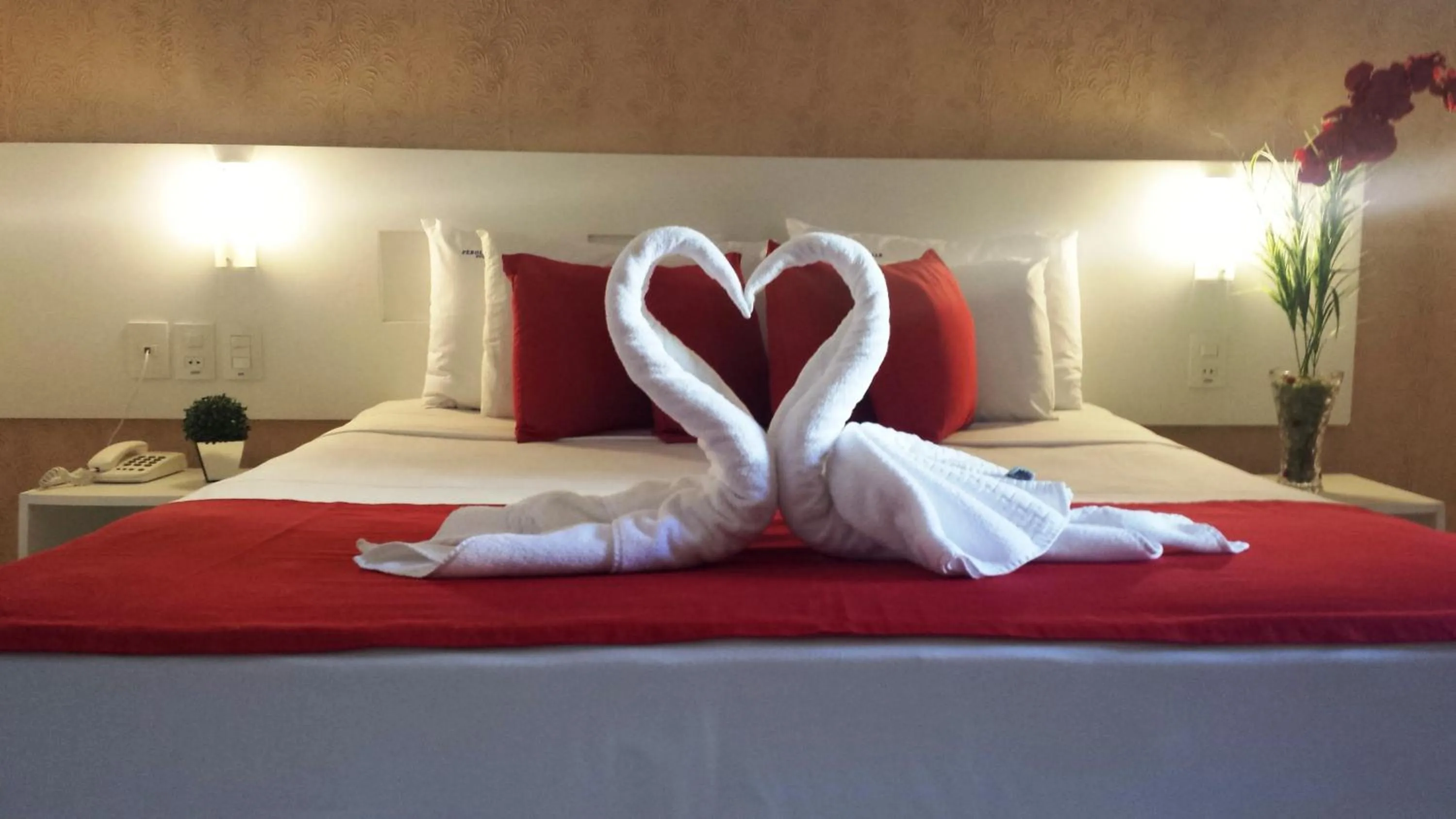 Bed in Pousada Pérola Dourada