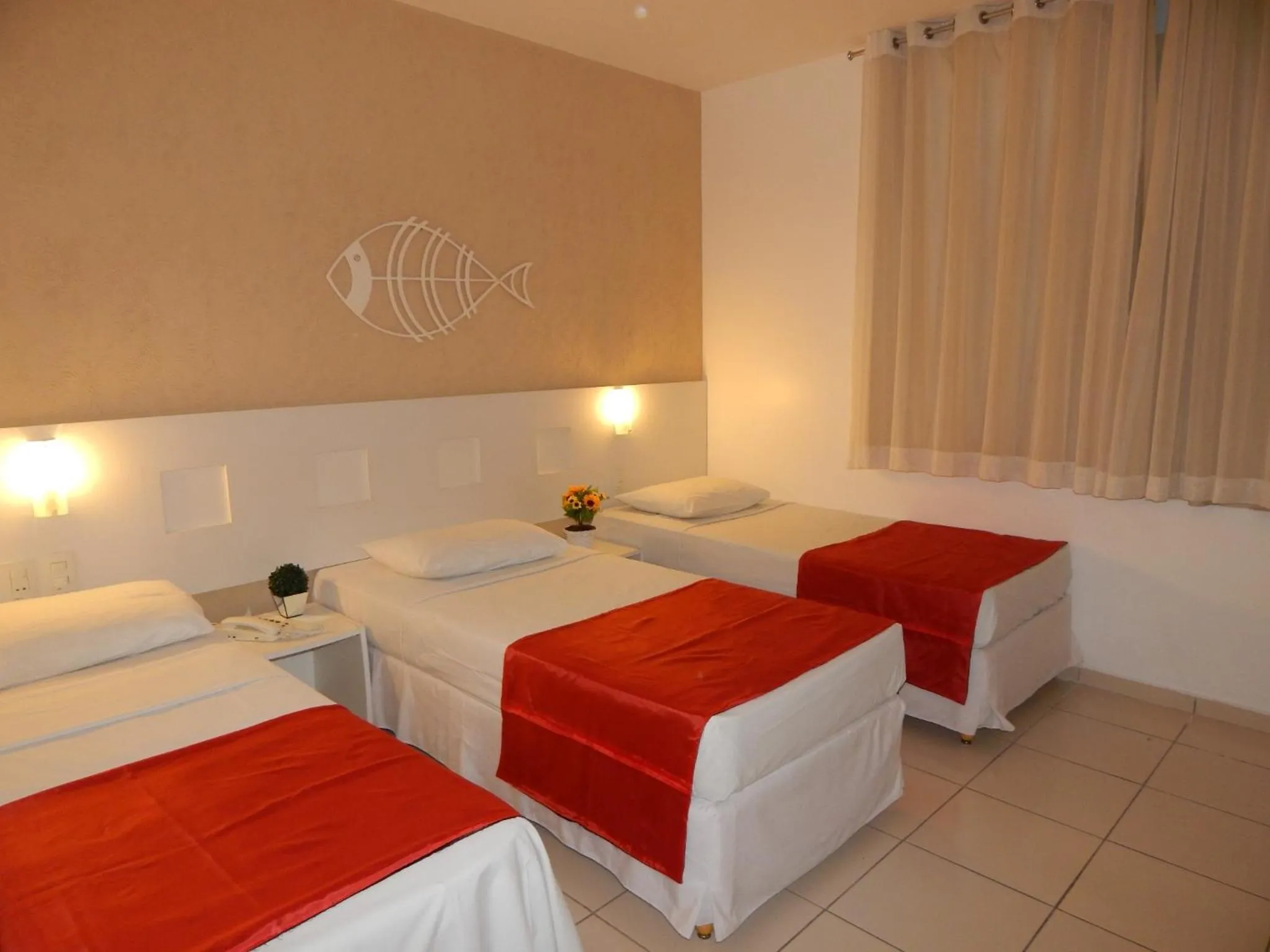 Bed in Pousada Pérola Dourada