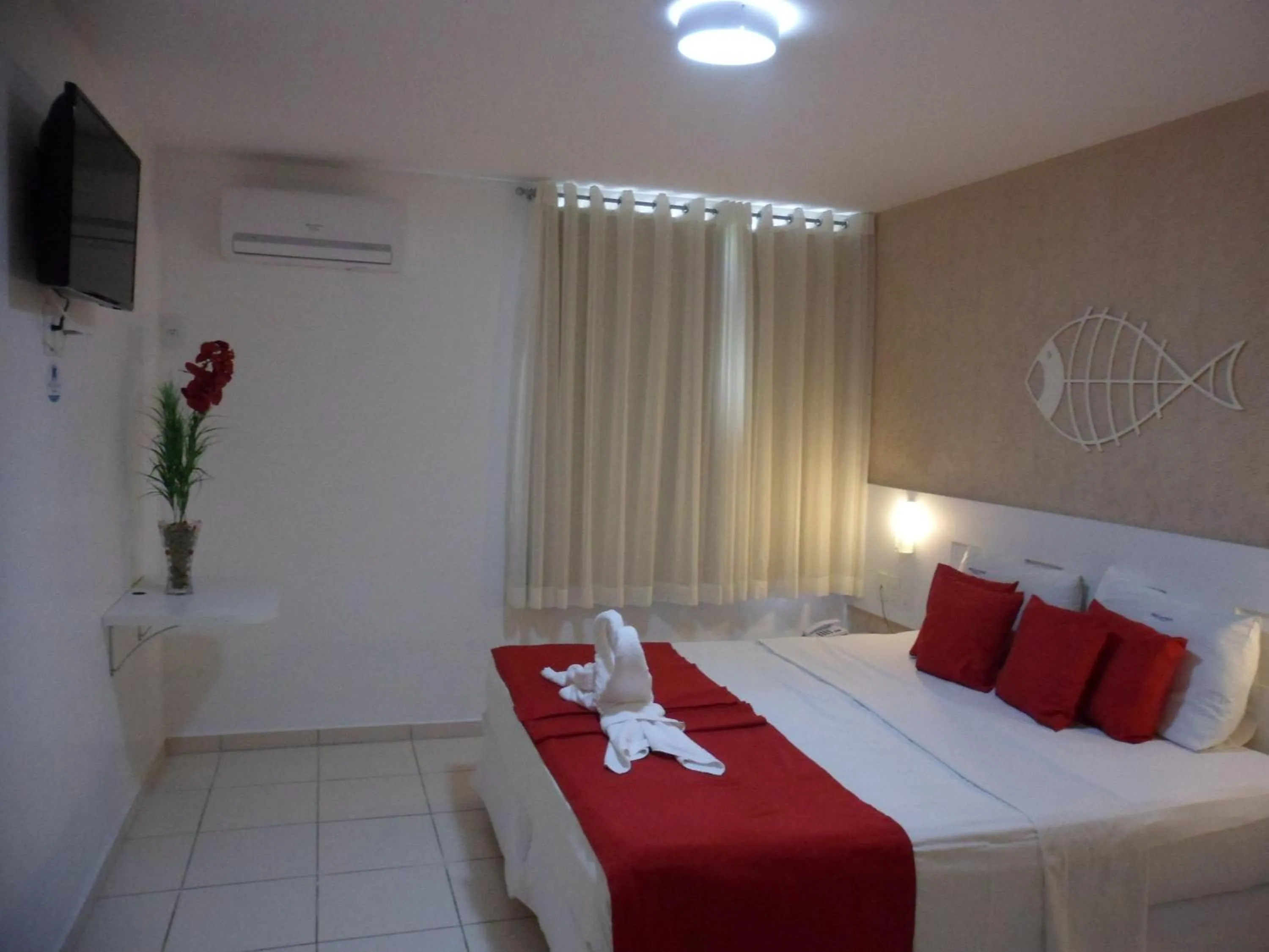 Bed in Pousada Pérola Dourada