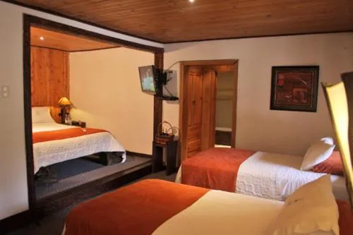 Bed in Hacienda Hostería Dos Chorreras