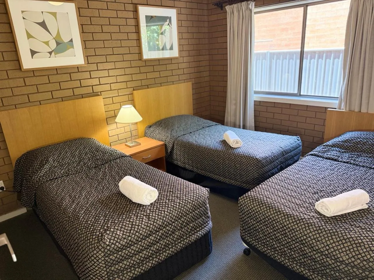 Bed in Parkview Motor Inn and Apartments