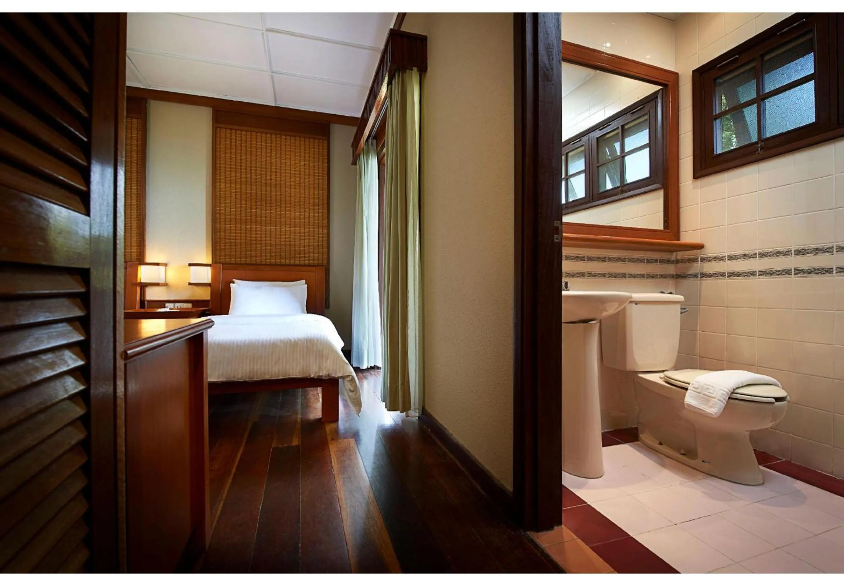 Bathroom, Bed in Redang Island Resort