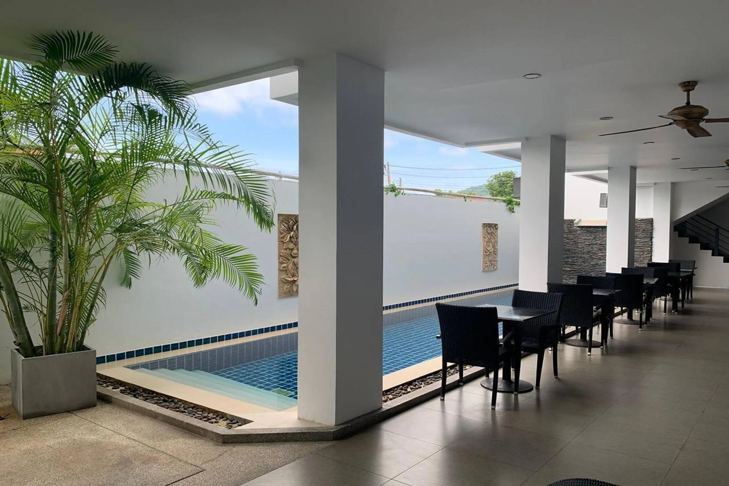 Pool view in One World One Home Naiharn Hotel