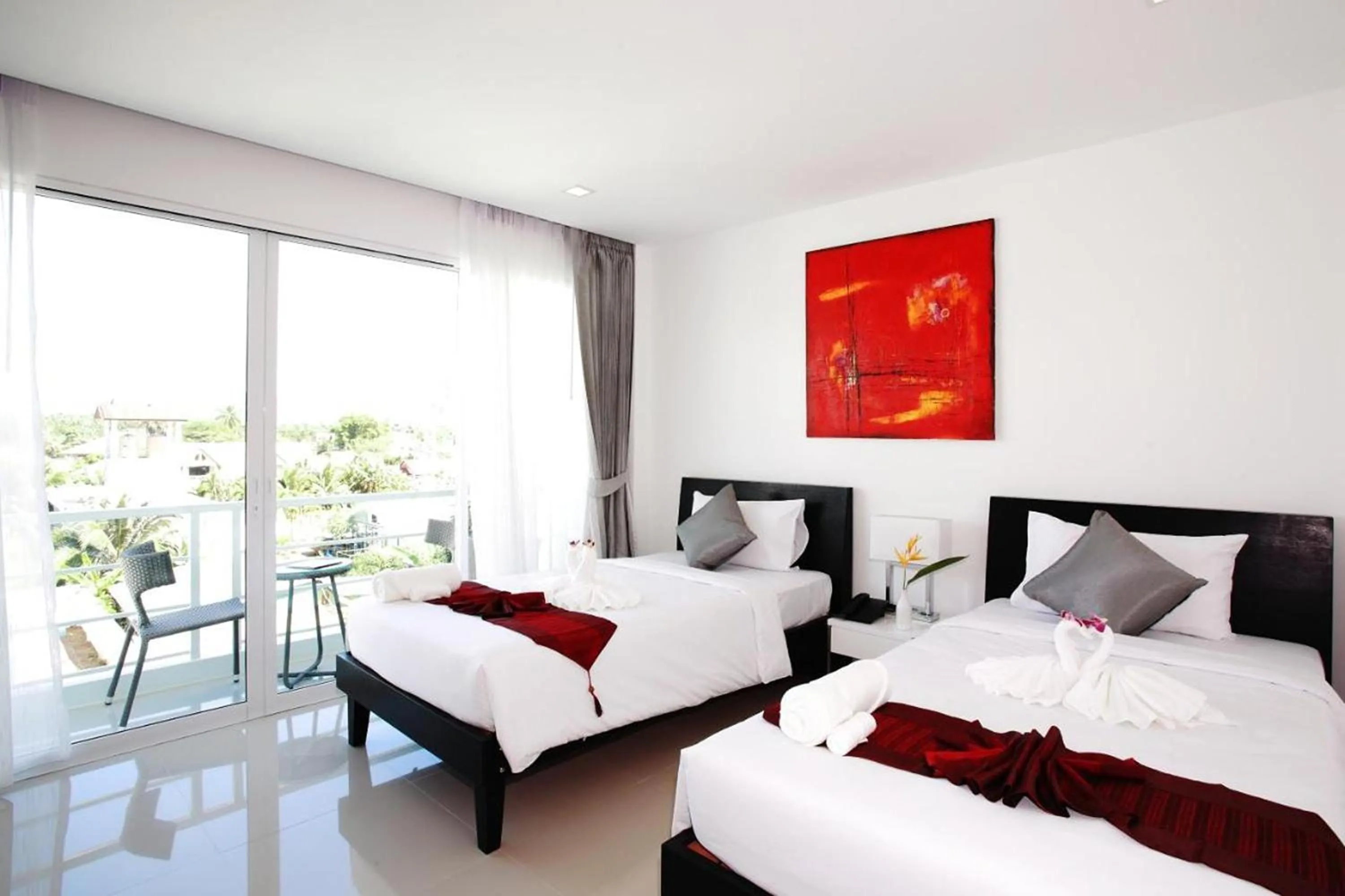 Bed in One World One Home Naiharn Hotel