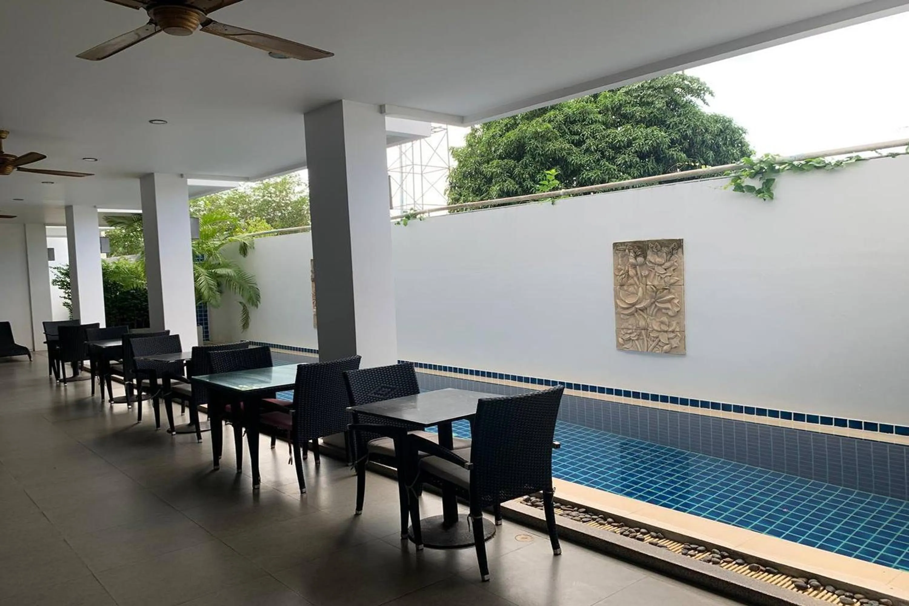 Pool view in One World One Home Naiharn Hotel