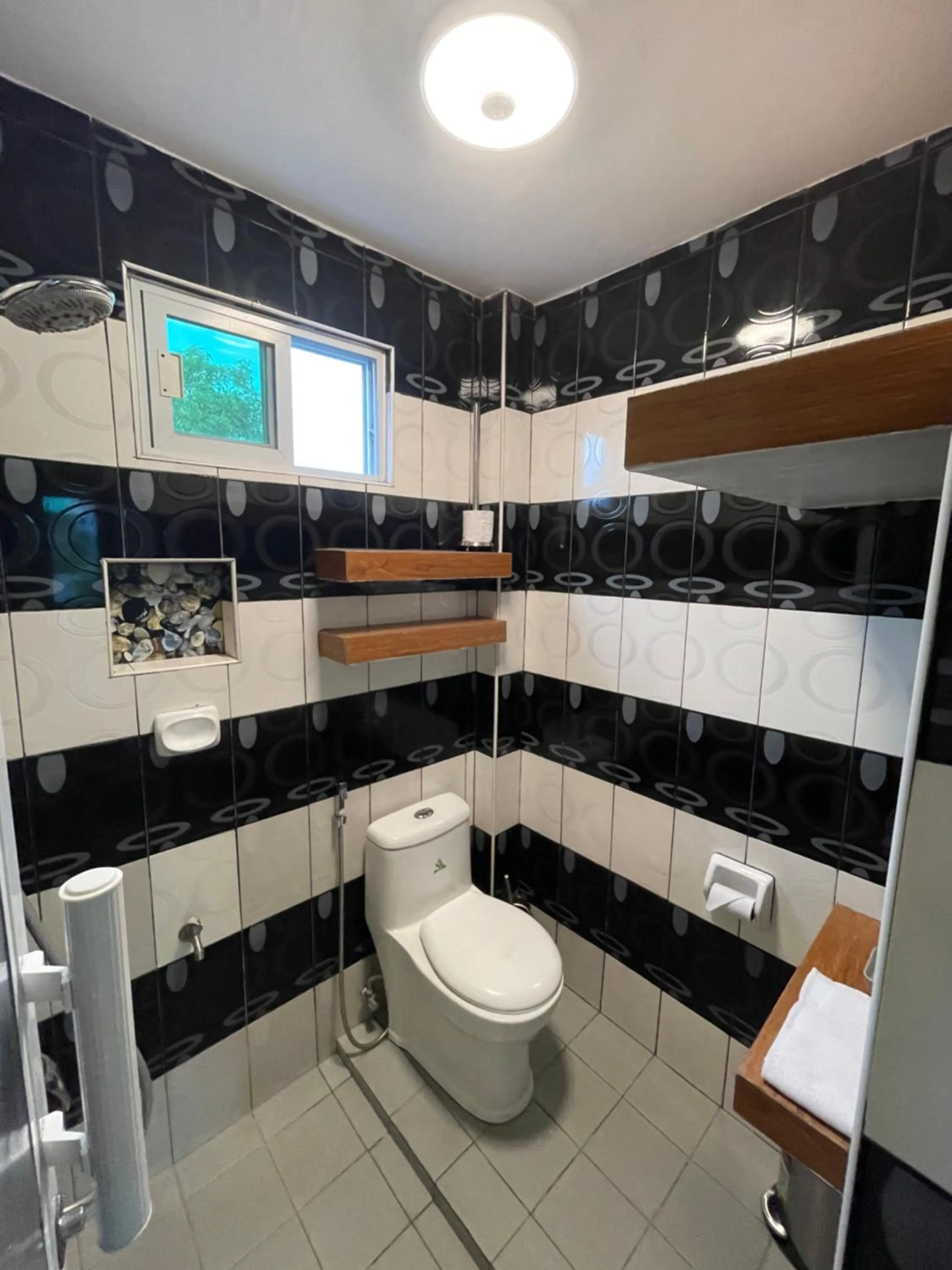 Shower in Italy Condotel Darasa