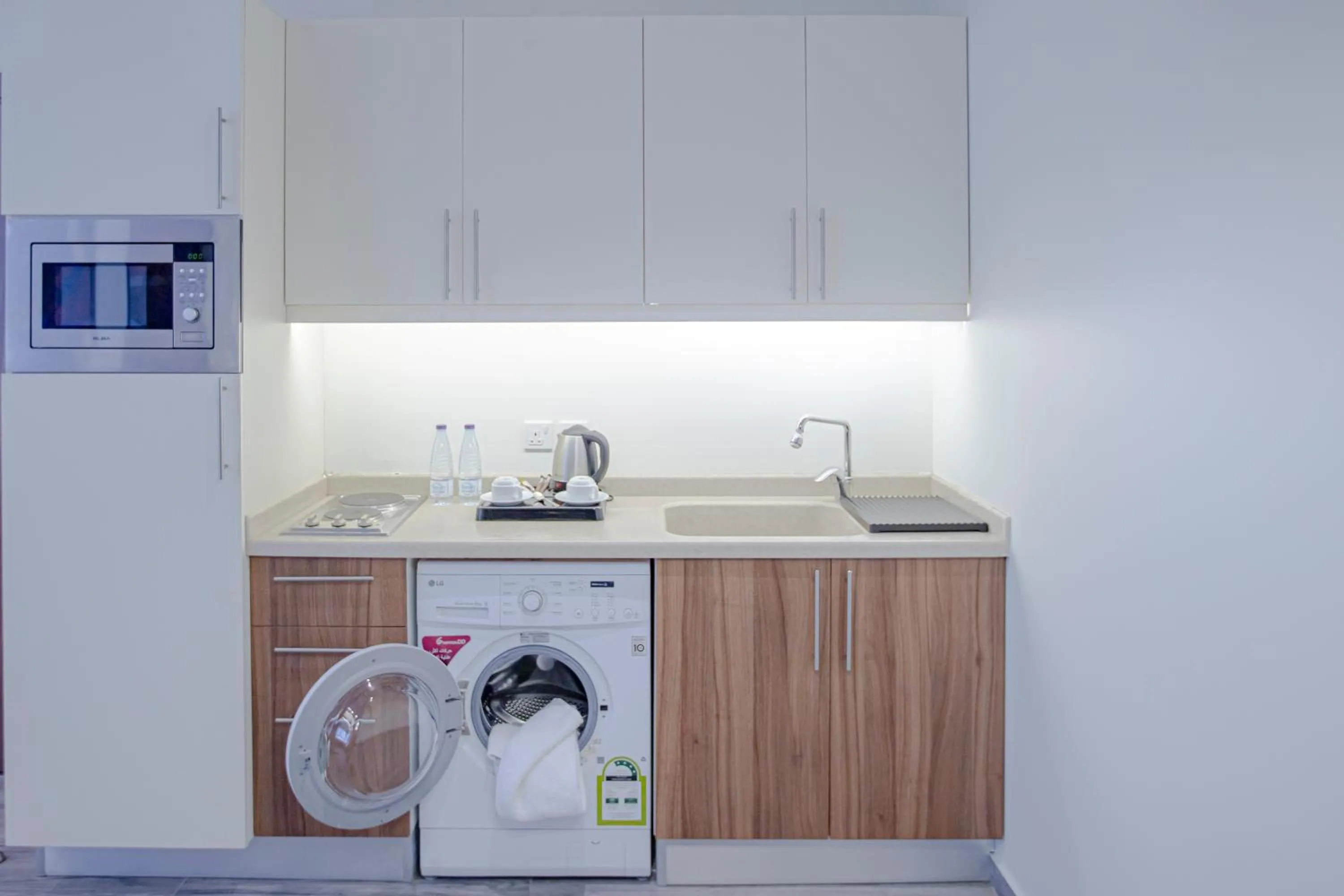 Kitchen or kitchenette in Hafawah Suites