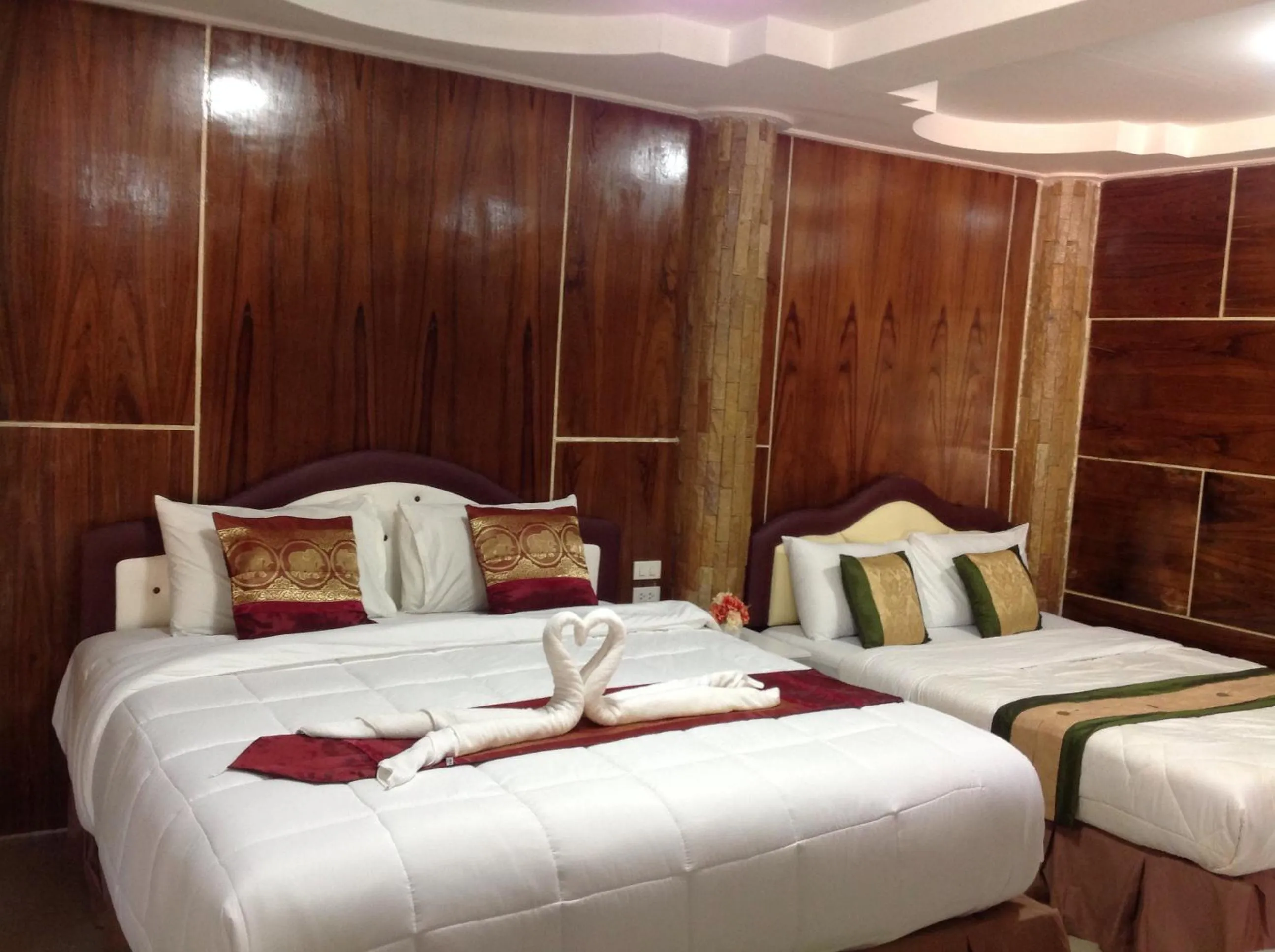 Bed in Ruan Mai Naiyang Beach Resort