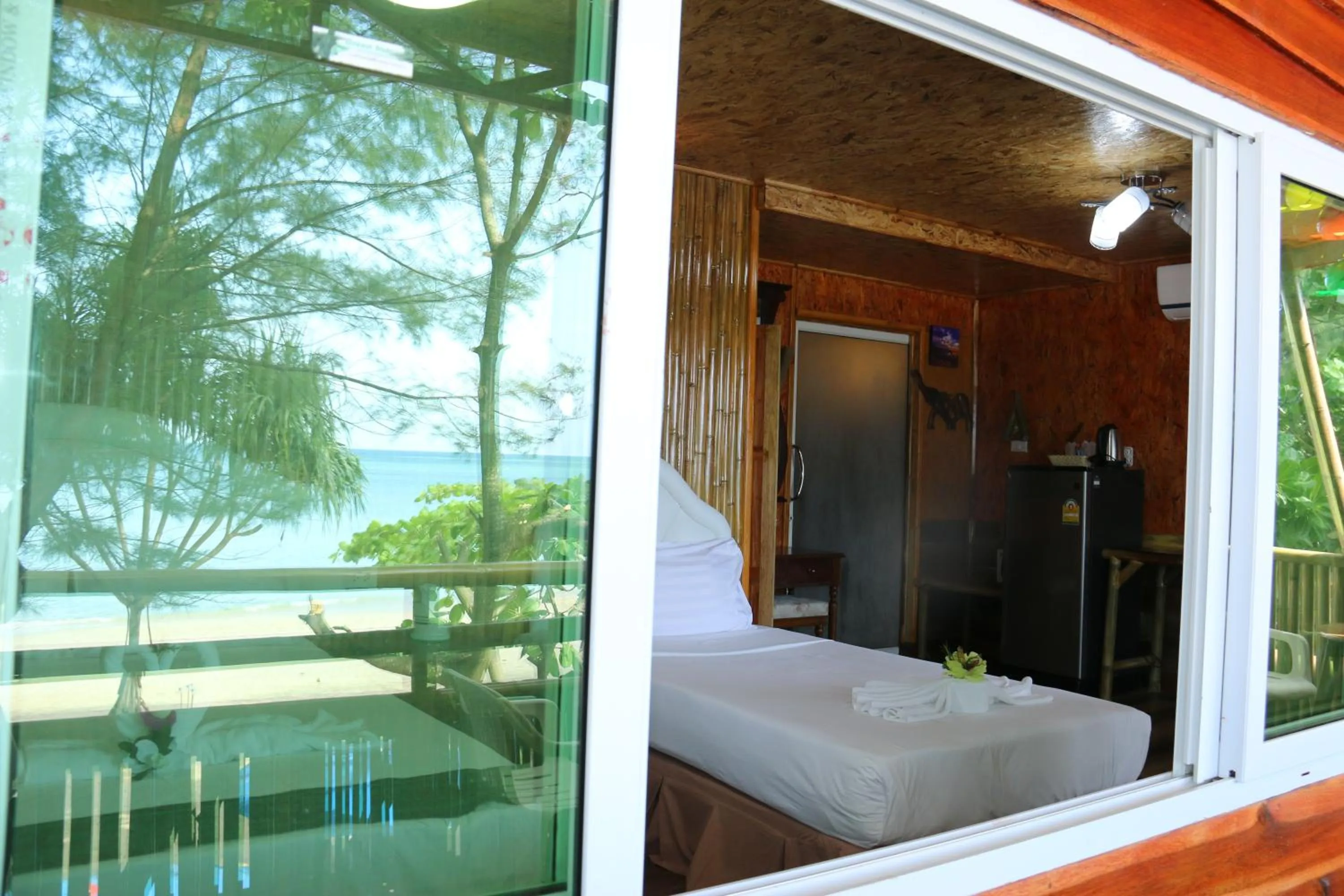 Bed in Ruan Mai Naiyang Beach Resort