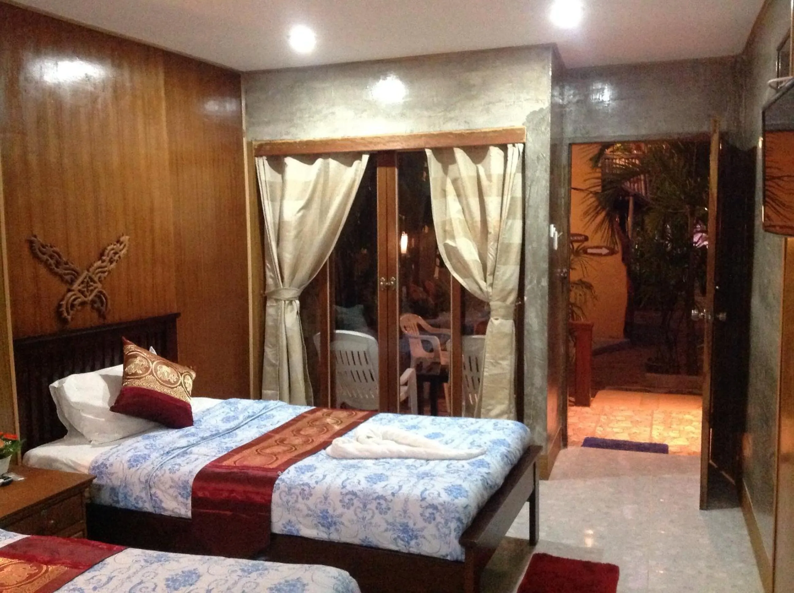 Bed in Ruan Mai Naiyang Beach Resort