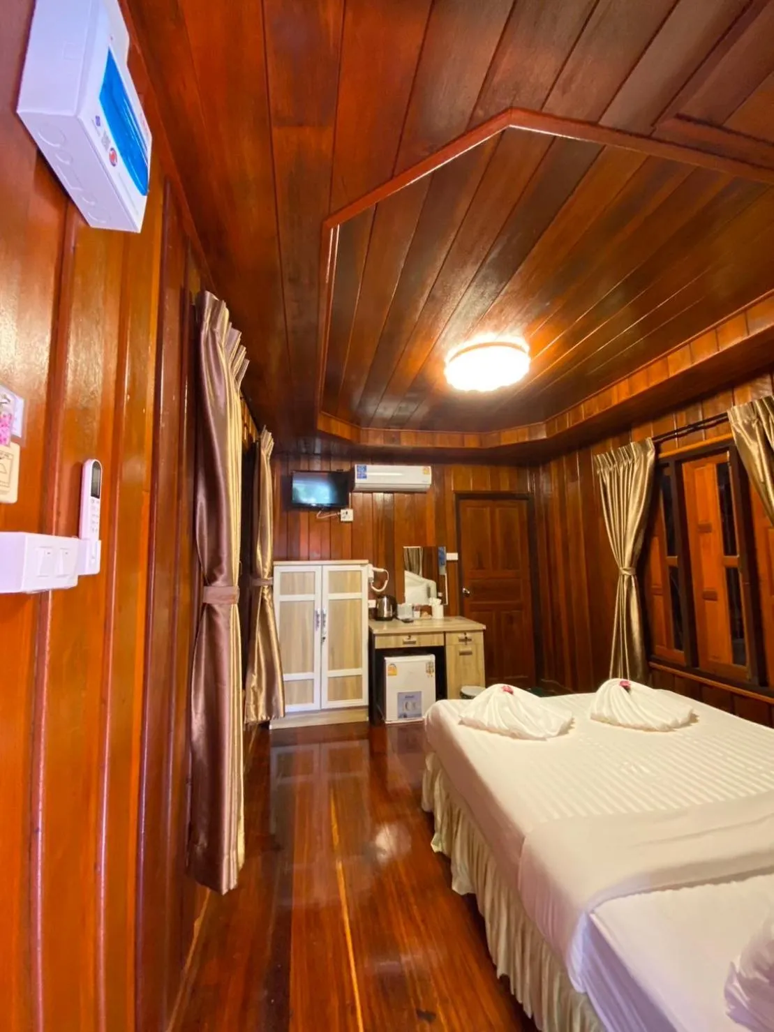 Bed in Ruan Mai Naiyang Beach Resort