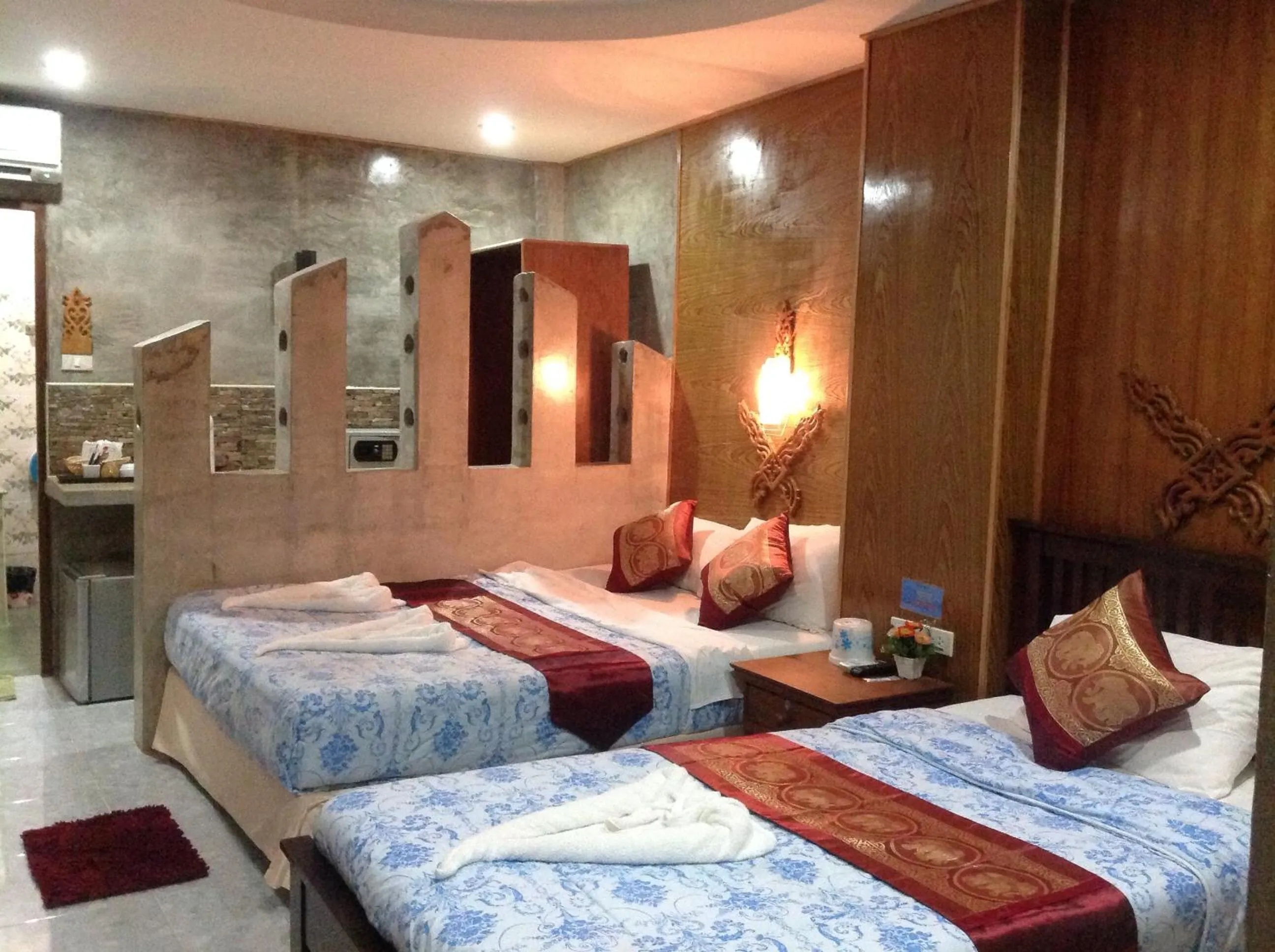 Bed in Ruan Mai Naiyang Beach Resort