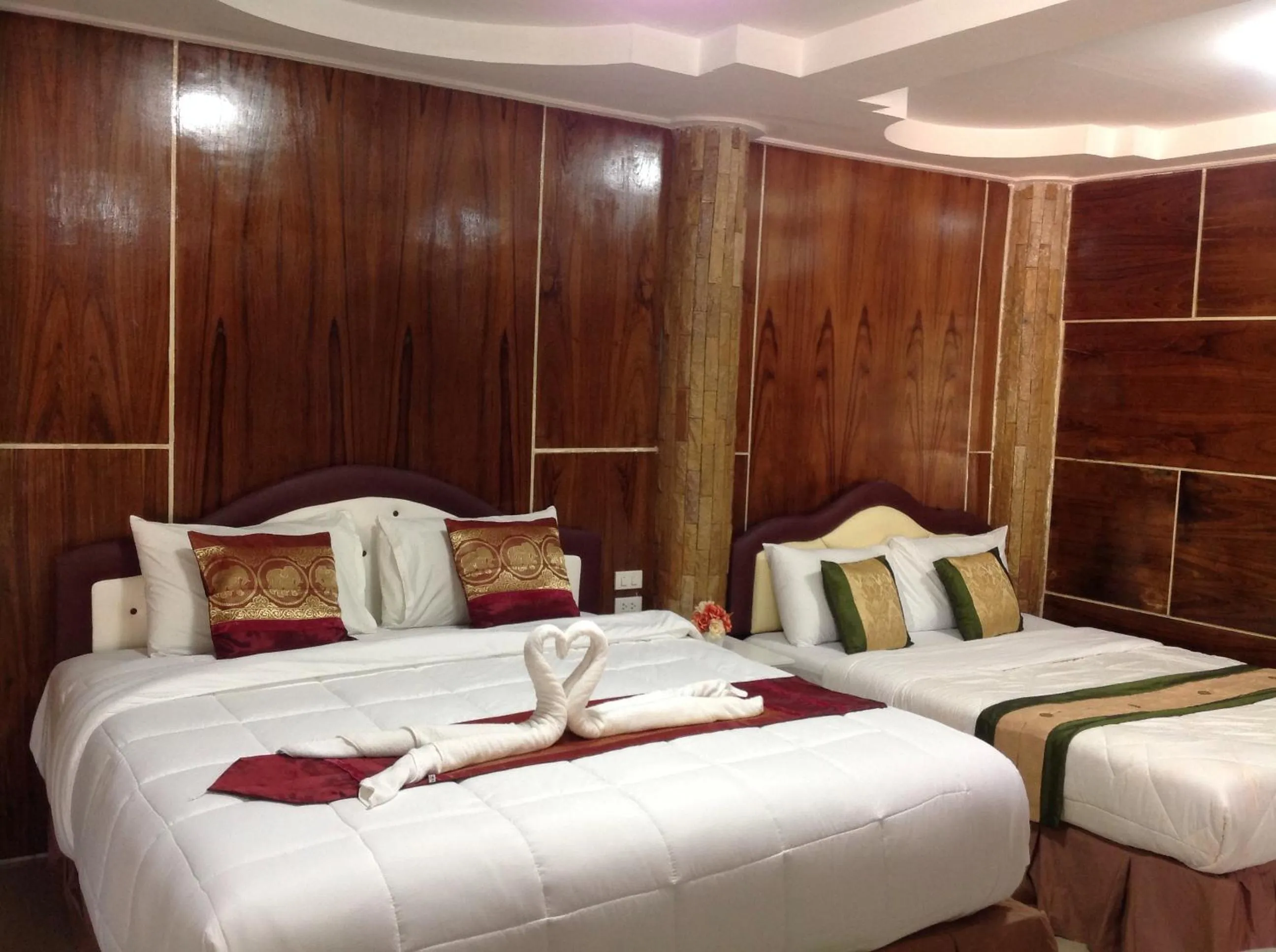 Bed in Ruan Mai Naiyang Beach Resort