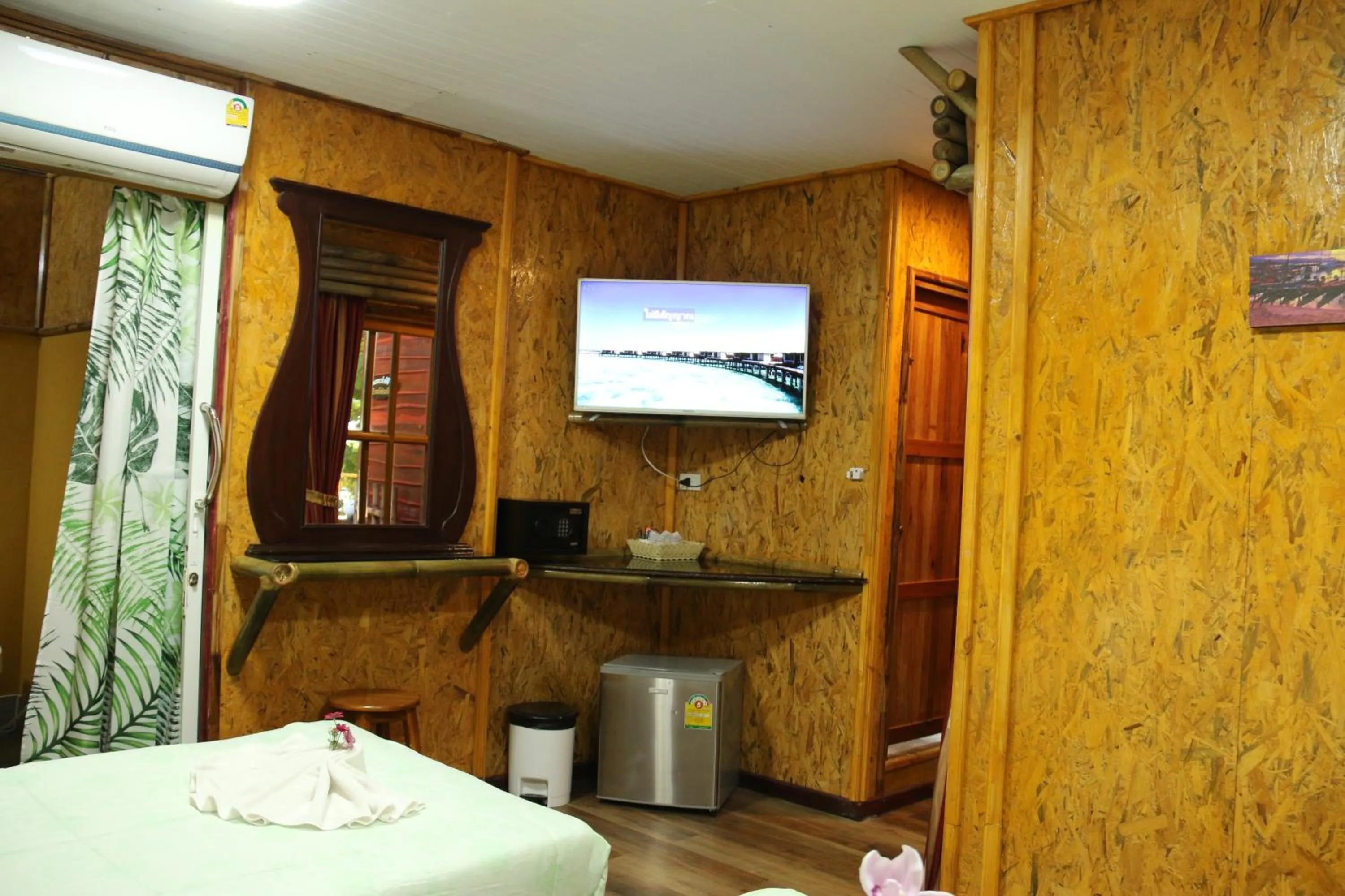 Bed in Ruan Mai Naiyang Beach Resort