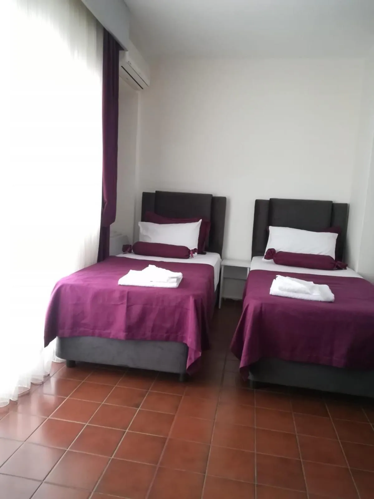 Bed in Andy's Apart Hotel