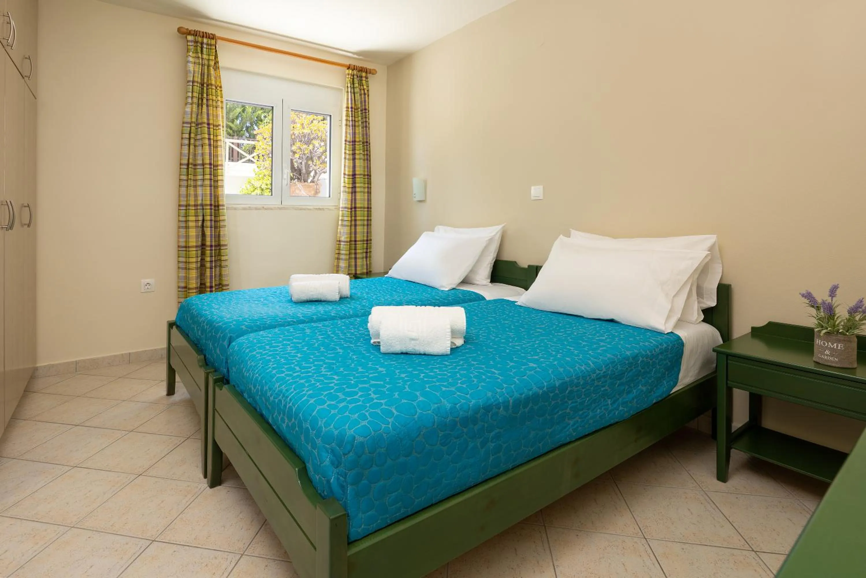 Bed in Armonia Apartments