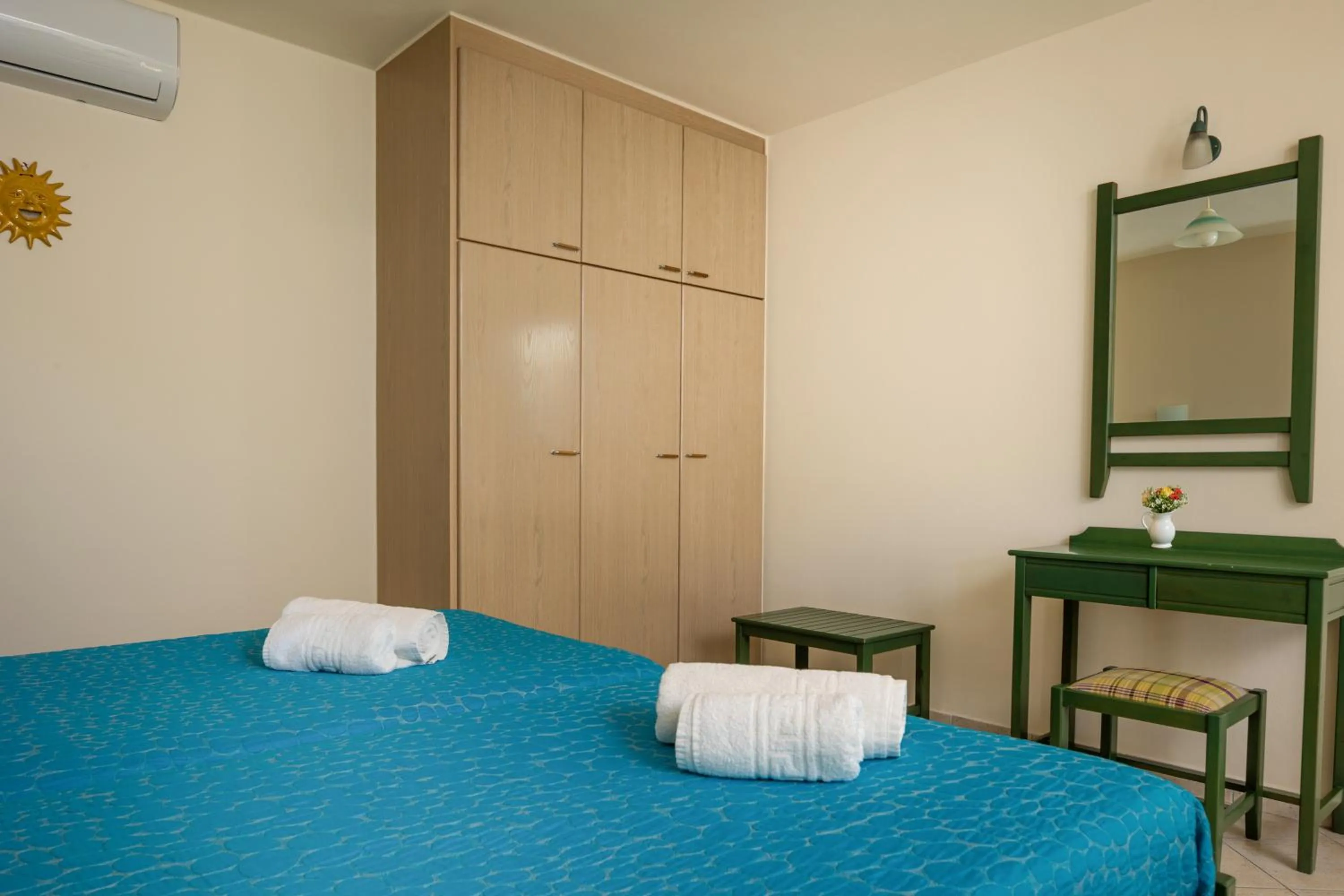 Bed in Armonia Apartments