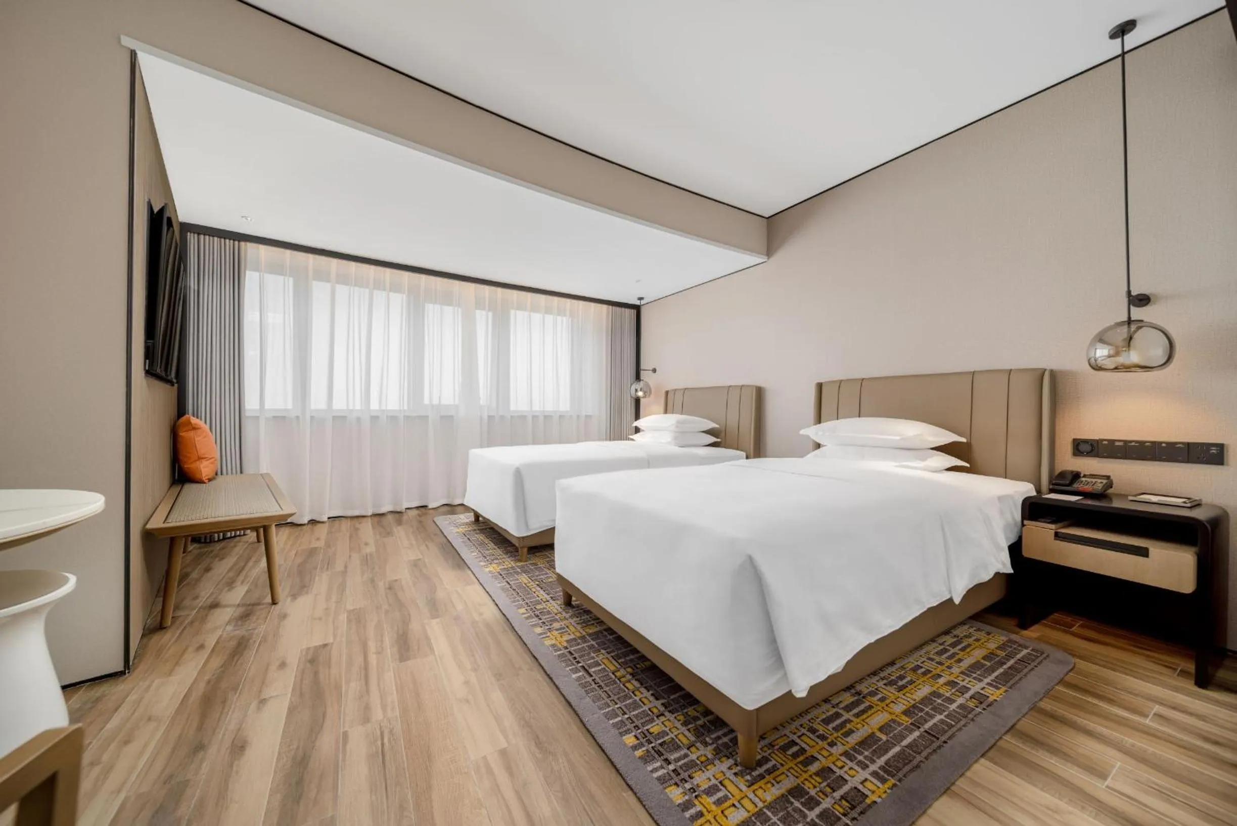 Bed in Sheraton Chengdu Lido Hotel