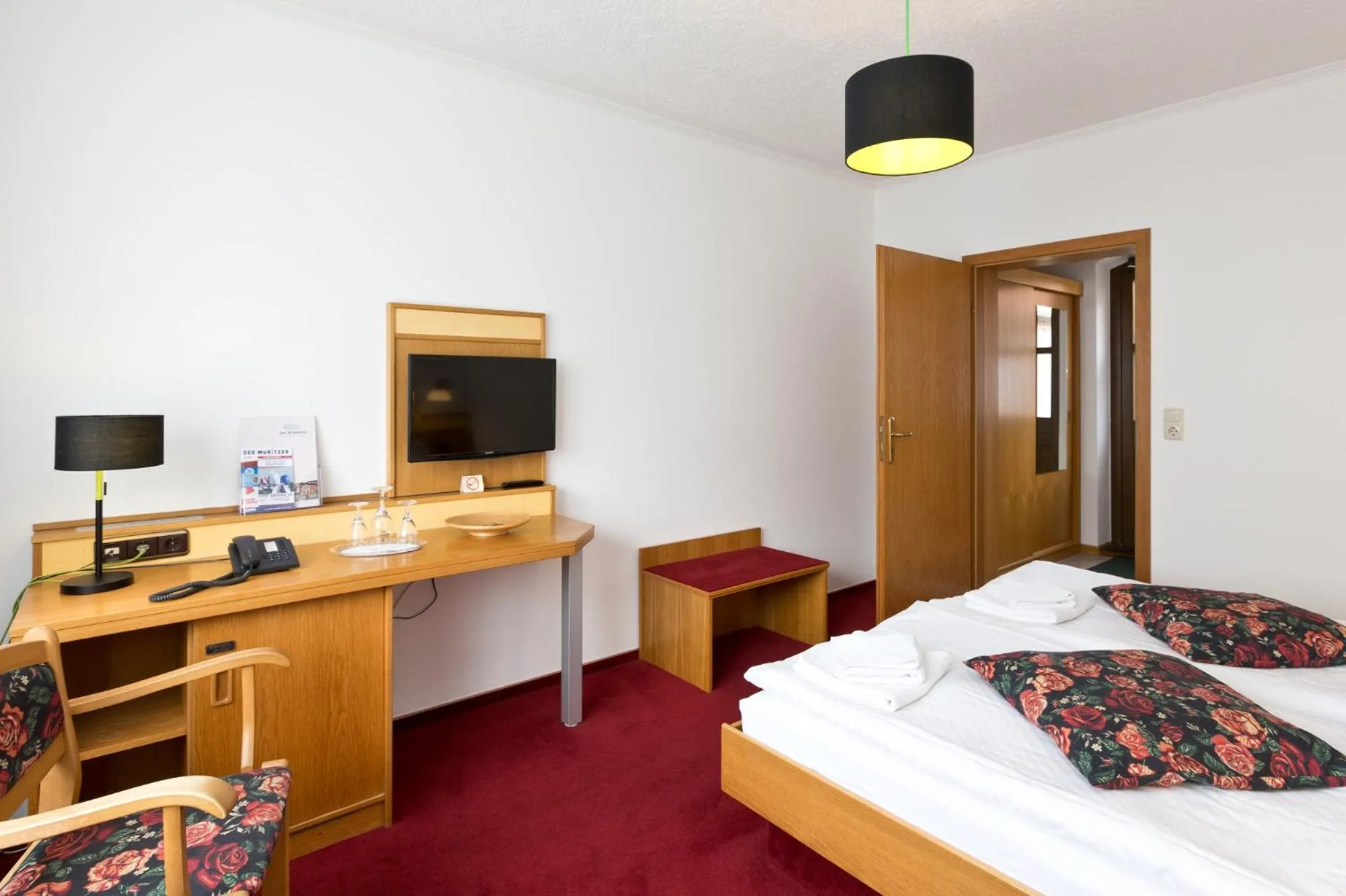 Photo of the whole room, Bed in Landhotel Zur Schmiede