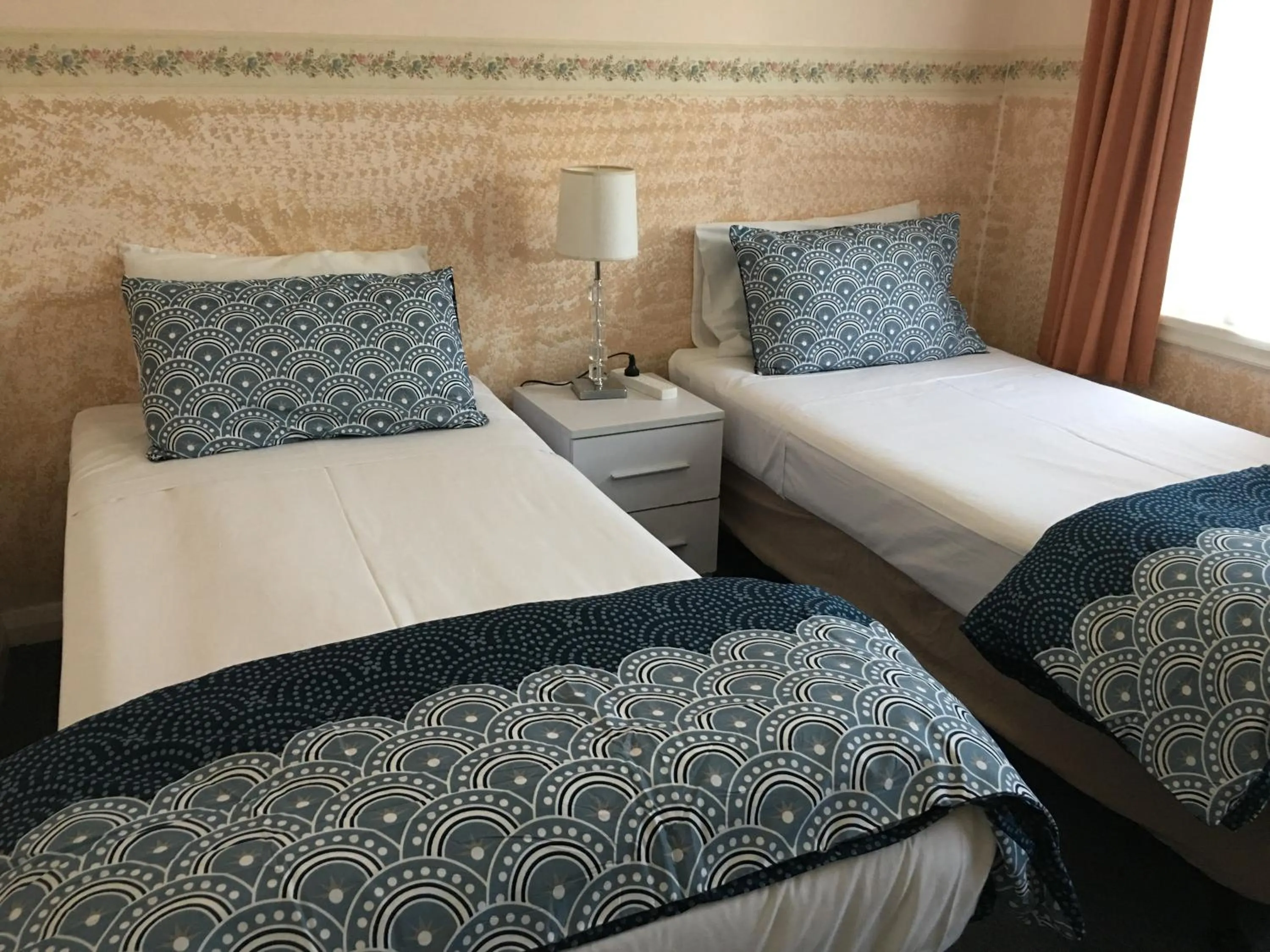 Bed in Hobart Apartments