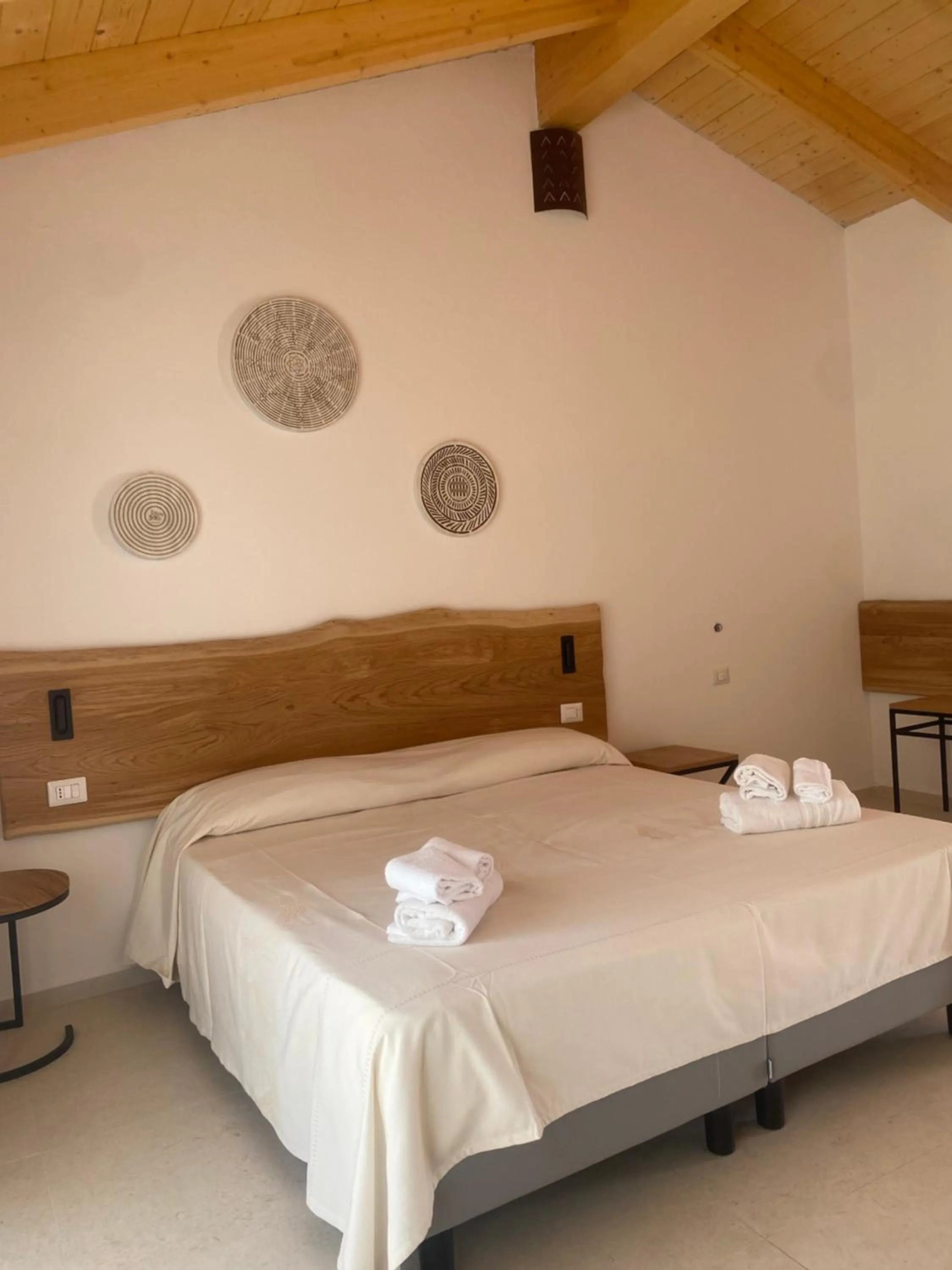 Bed in Hotel Le Mimose