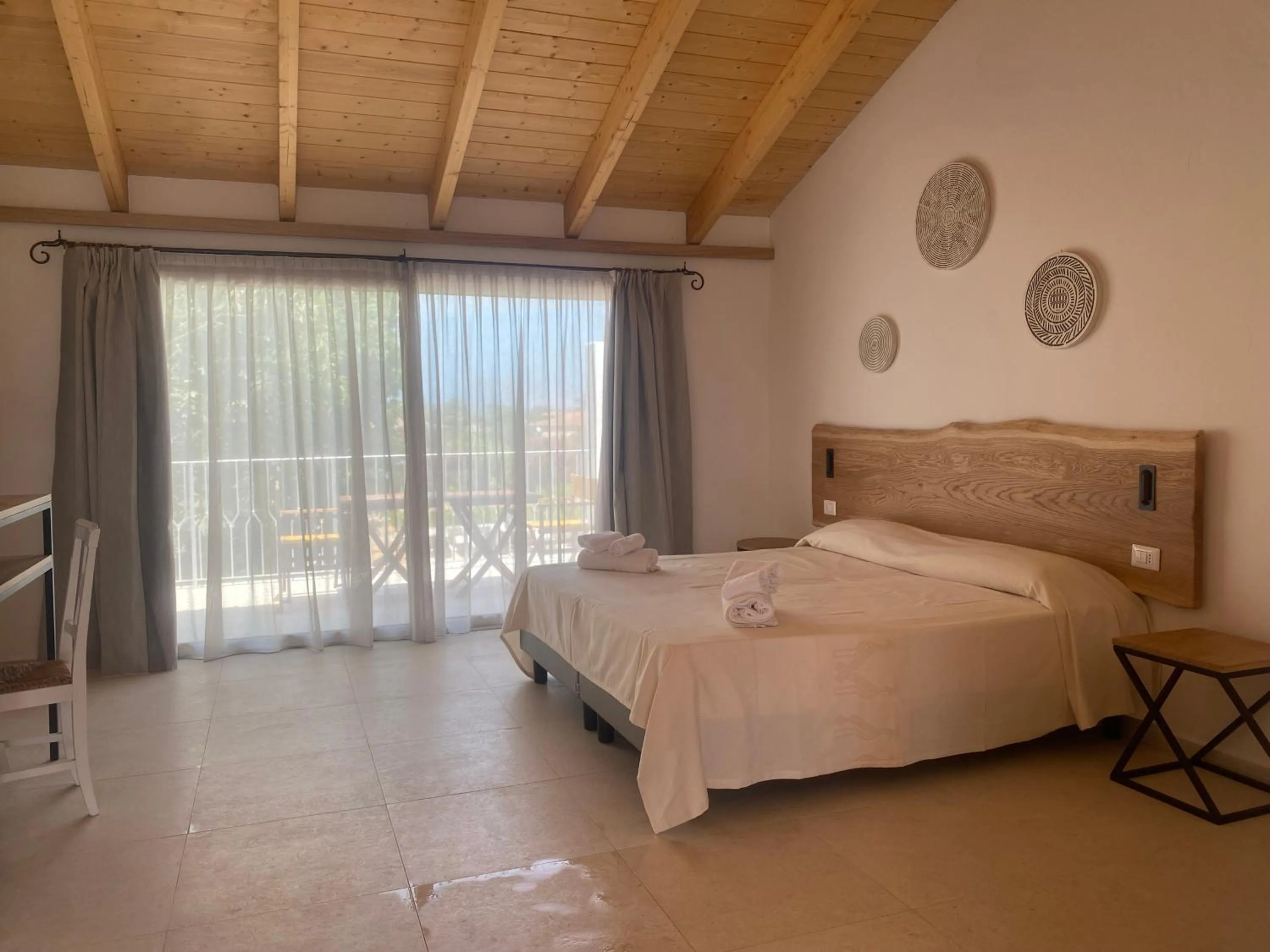 Bed in Hotel Le Mimose