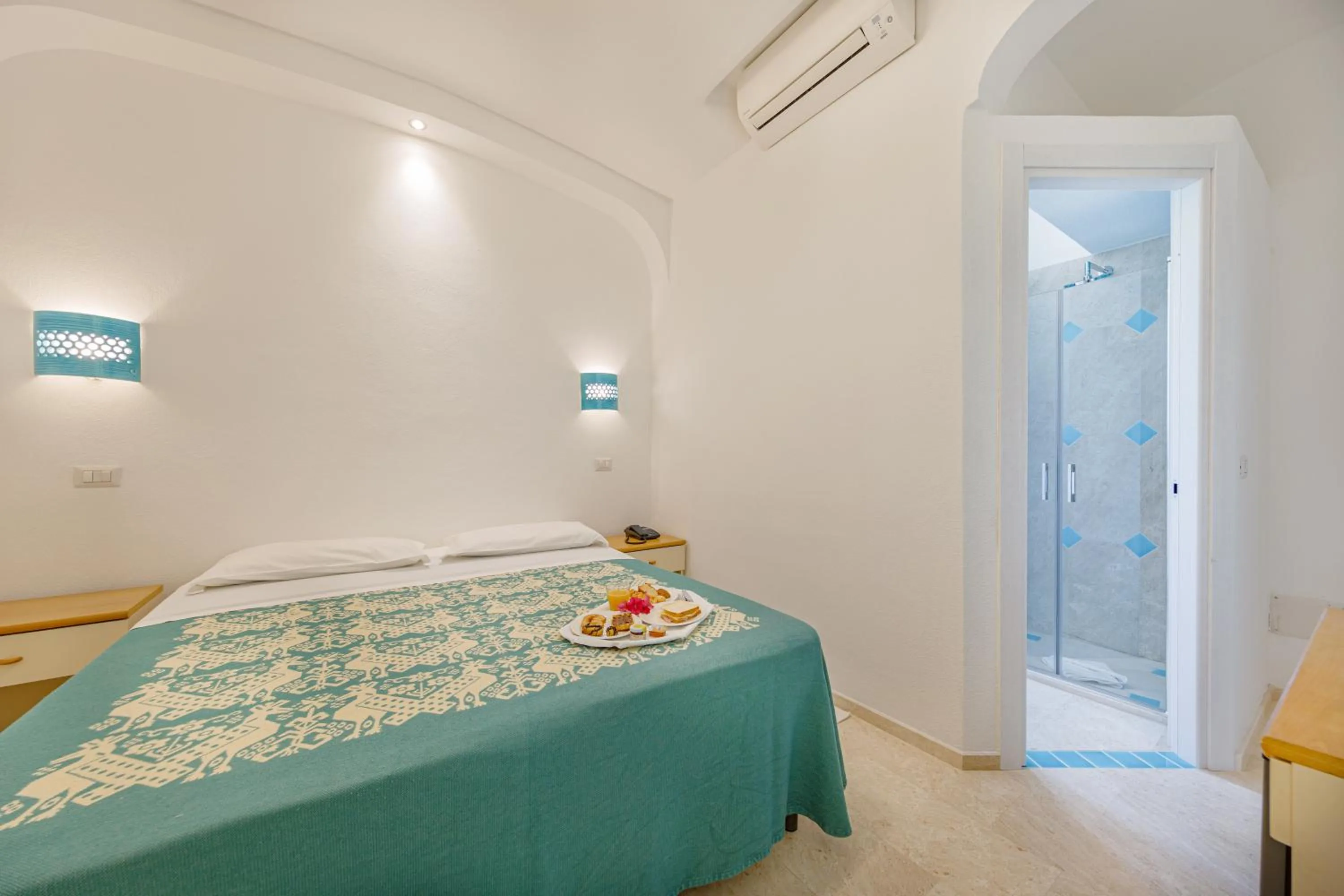 Bed in Hotel Le Mimose