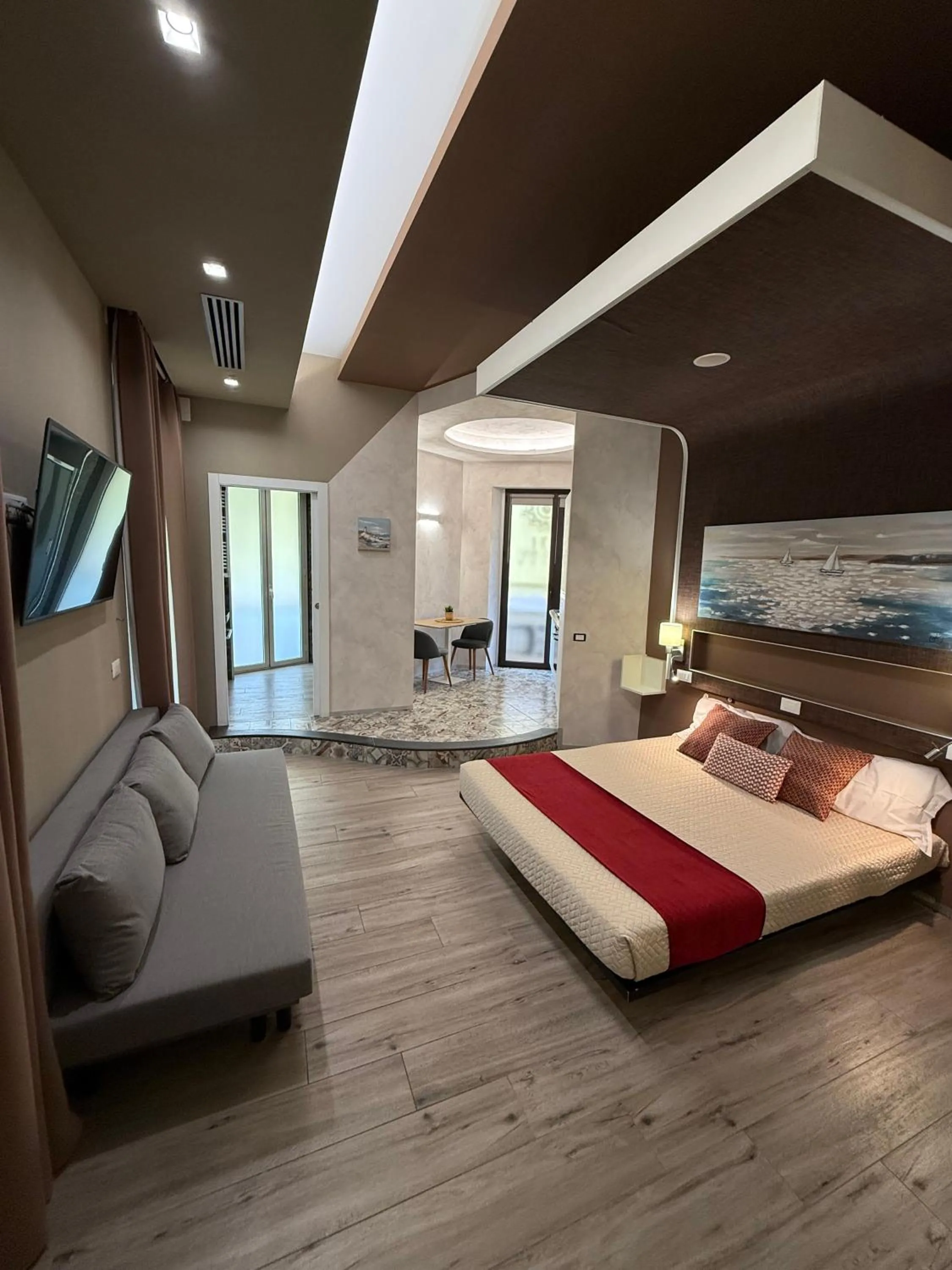 Bed in Th Luxury Rooms & Apartment