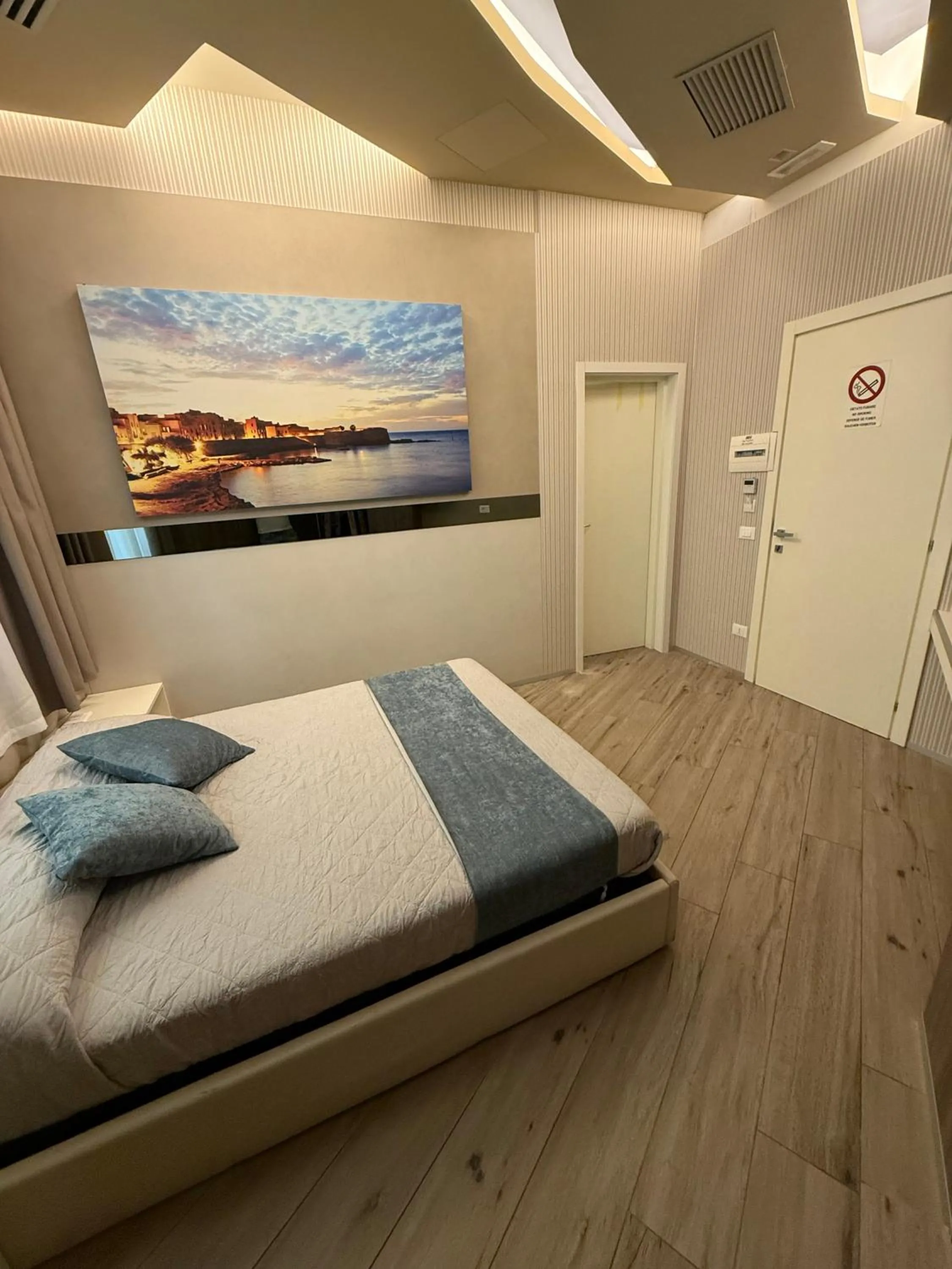 Bed in Th Luxury Rooms & Apartment