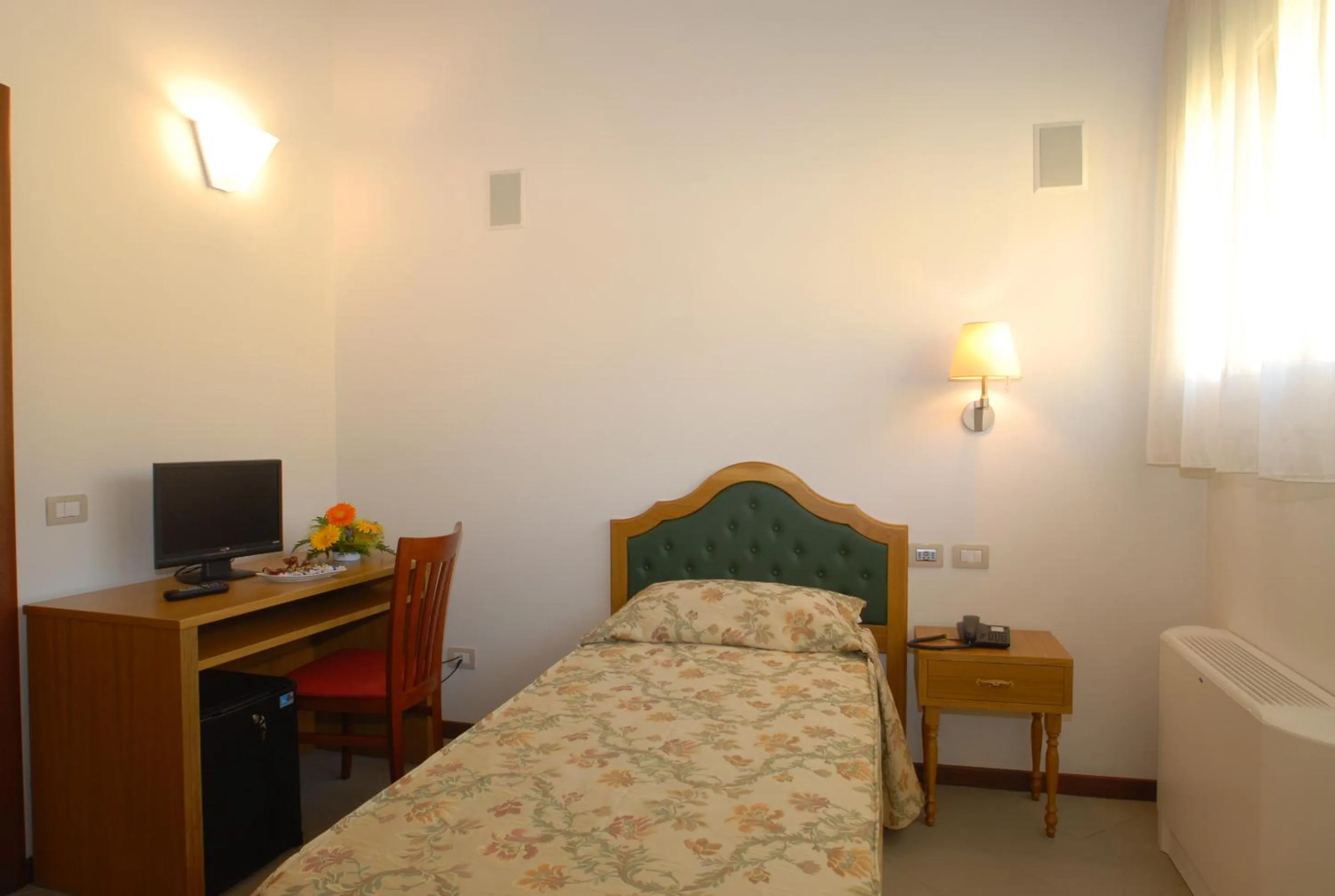 Bed in Villa Aretusi