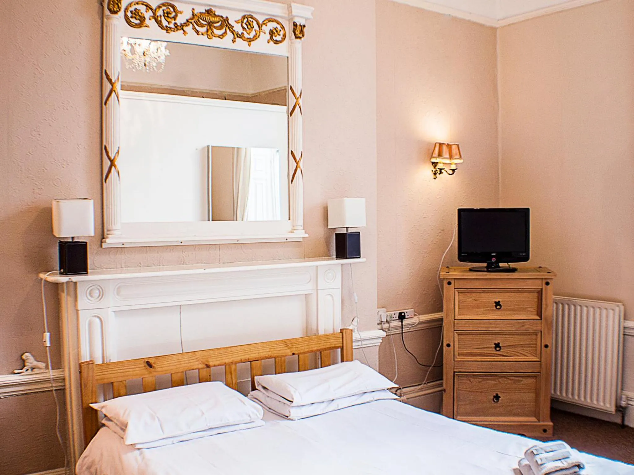 Bed in The Queensbury Hotel