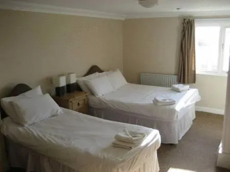 Bed in The Queensbury Hotel