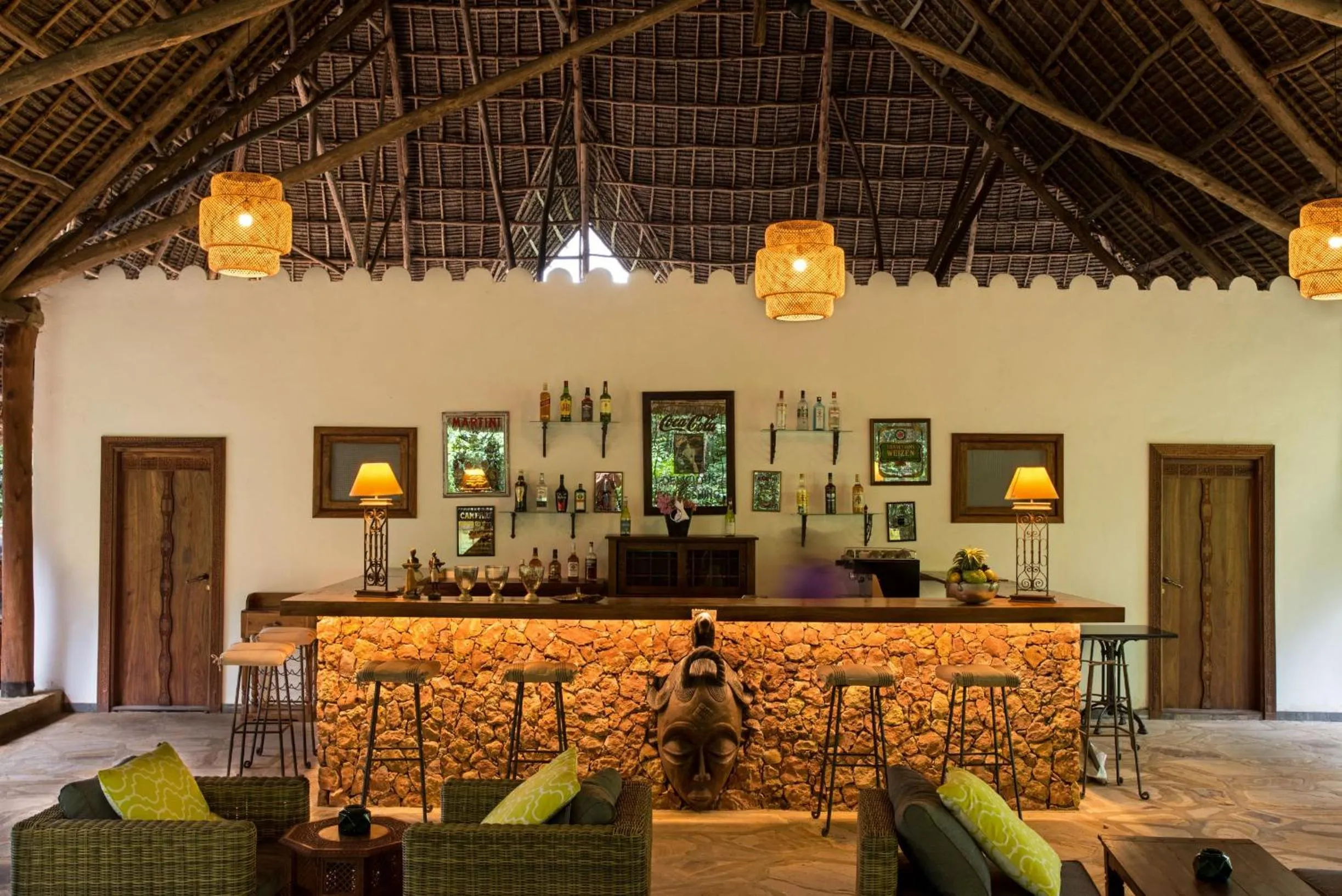 Communal lounge/ TV room in Tikitam Palms Boutique Hotel