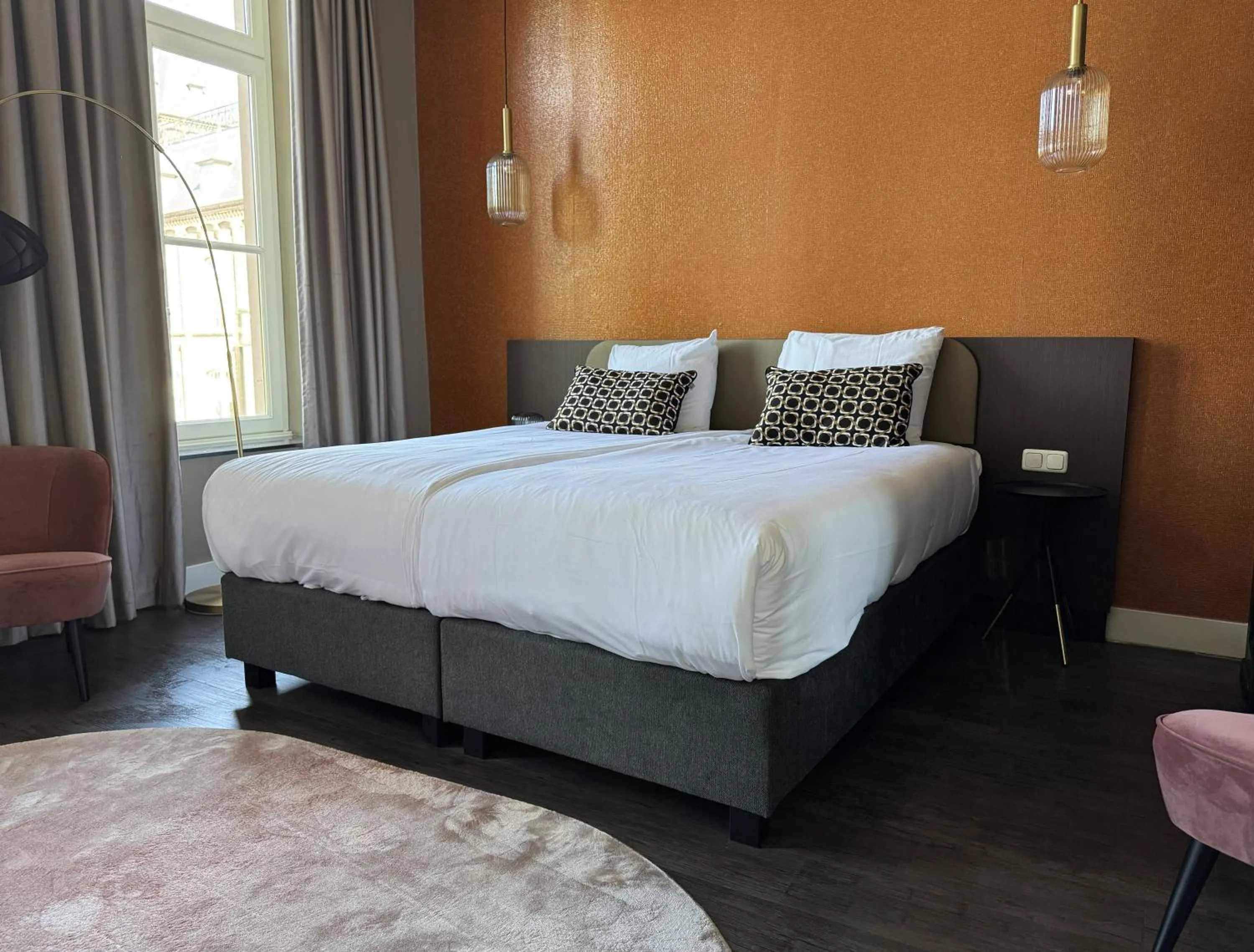 Bed in MERICI Hotel Sittard