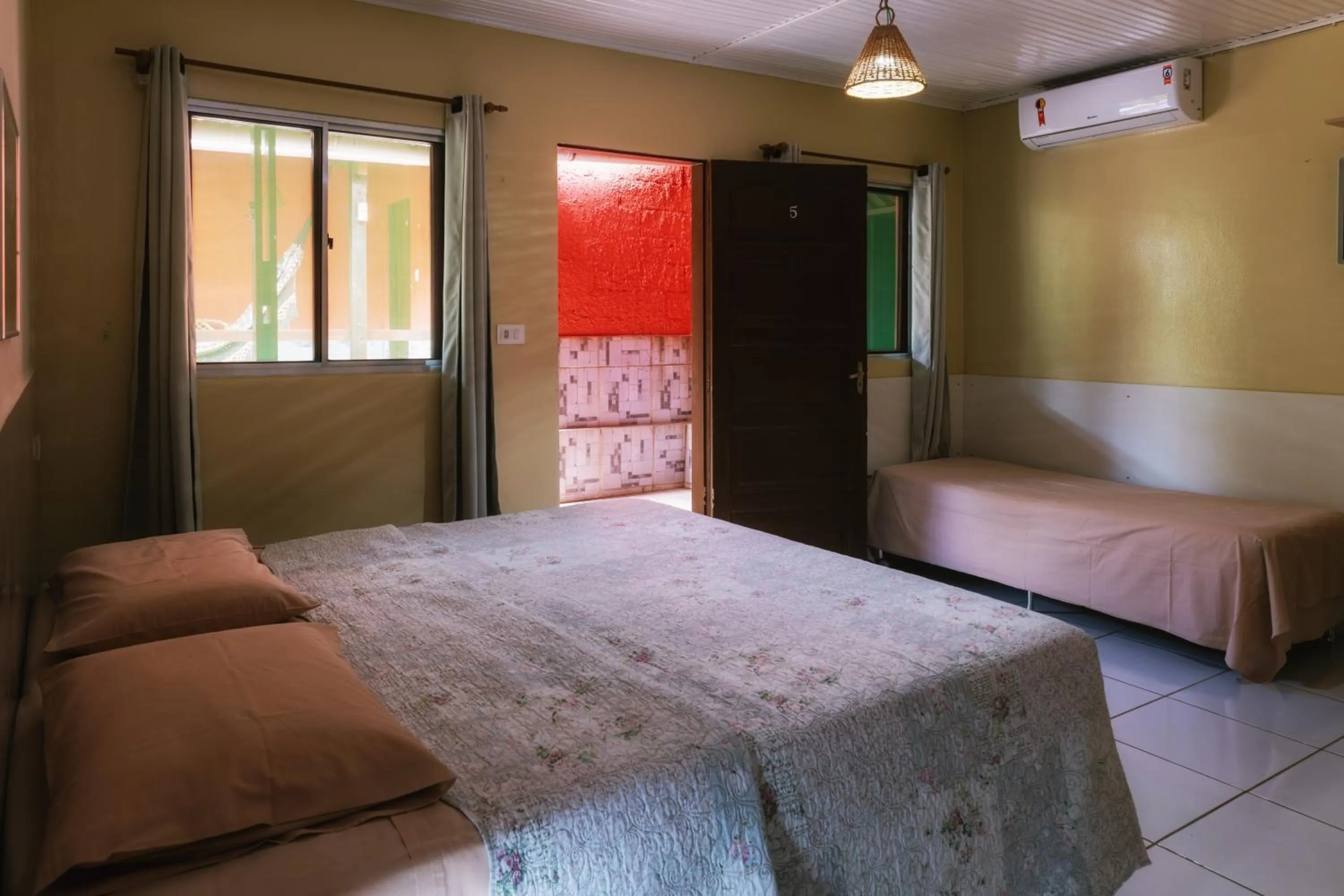 Bed in Pousada Mabuya