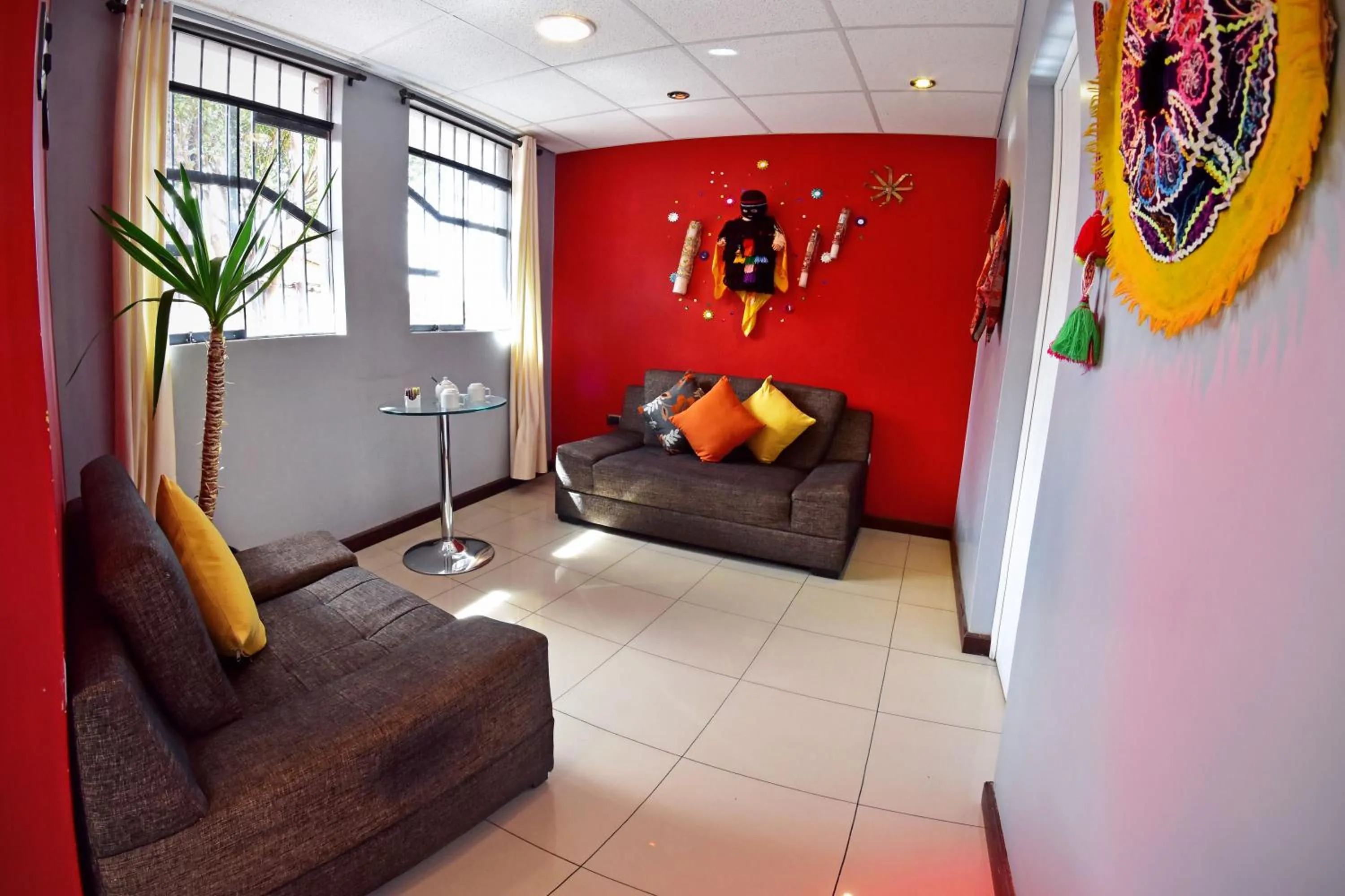 Communal lounge/ TV room in Wifala Thematic Hotel Boutique