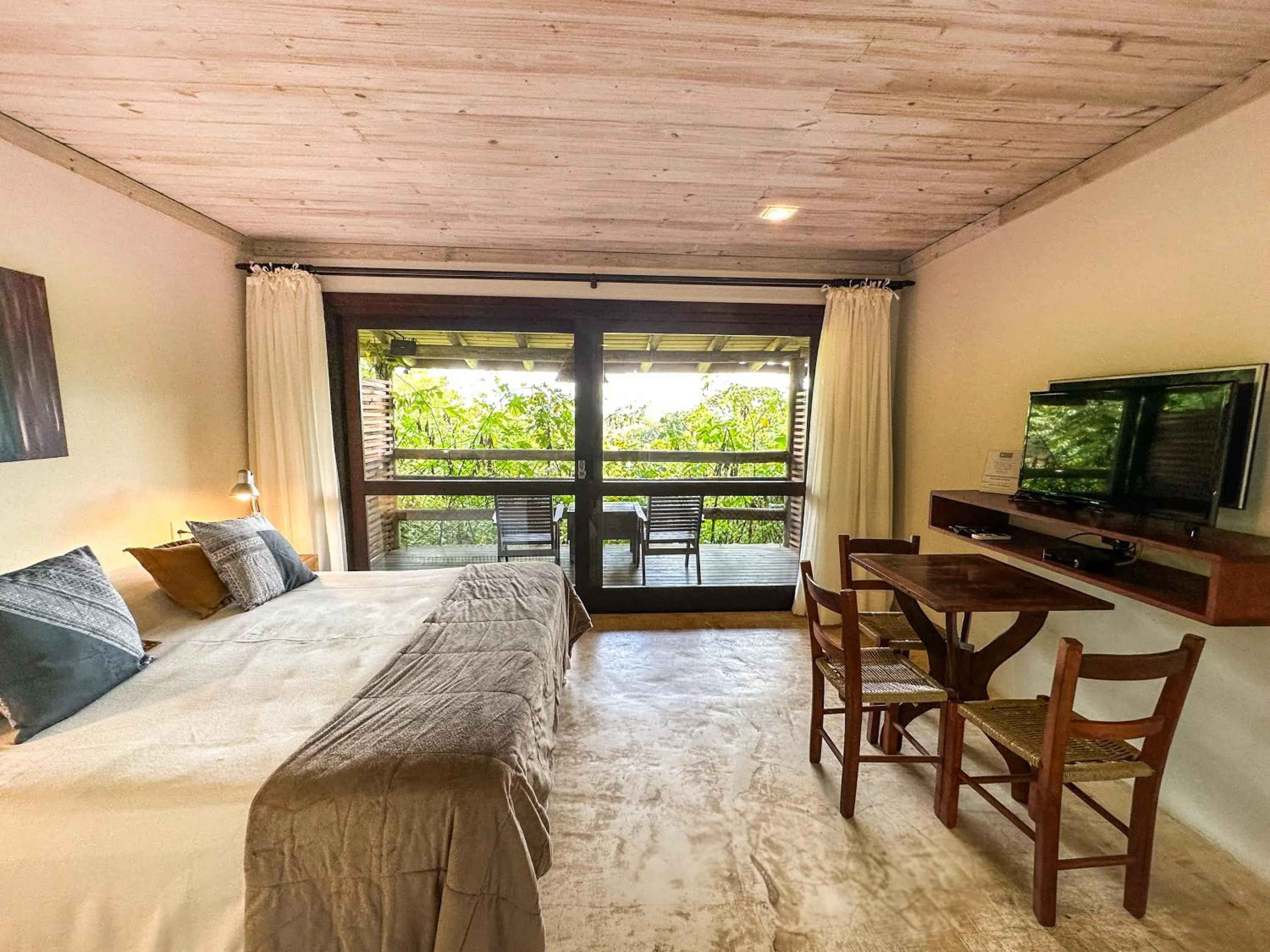 Bed in Morada da Praia do Rosa Pousada