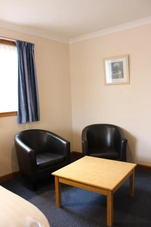 Seating area in Sky Lodge Perth