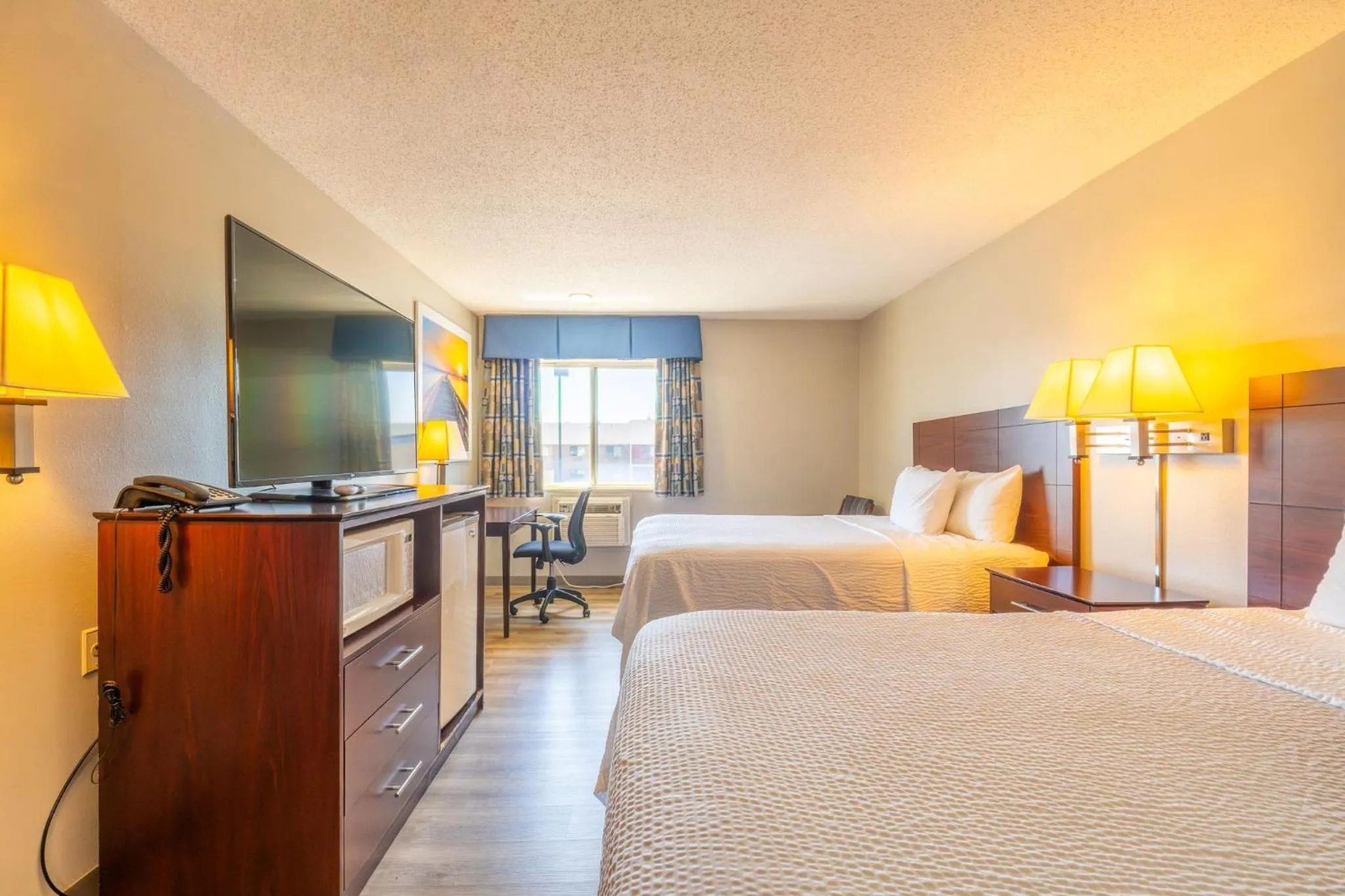 Bed in Days Inn by Wyndham Sioux City