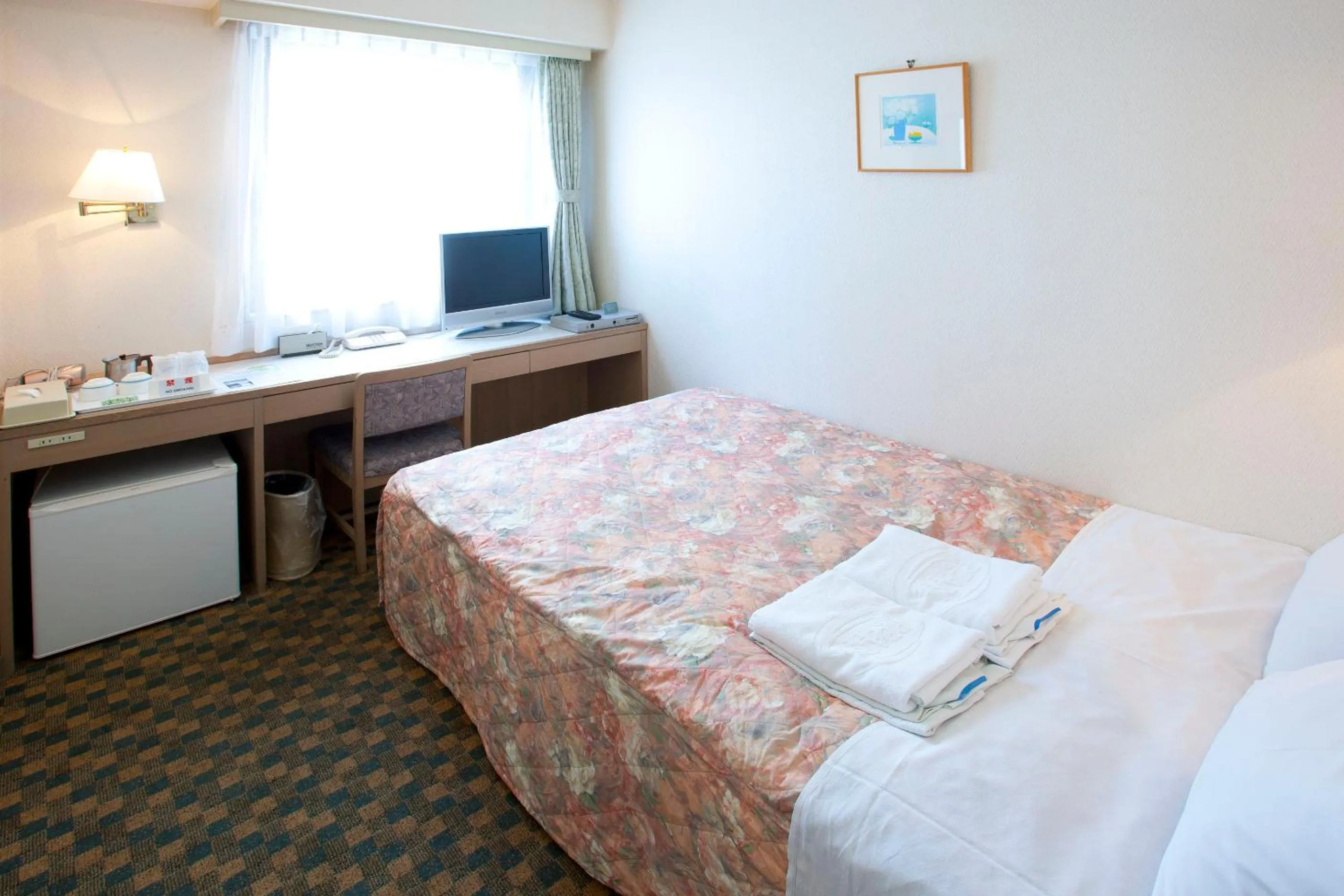 TV/Entertainment Center in Pearl Hotel Kasai