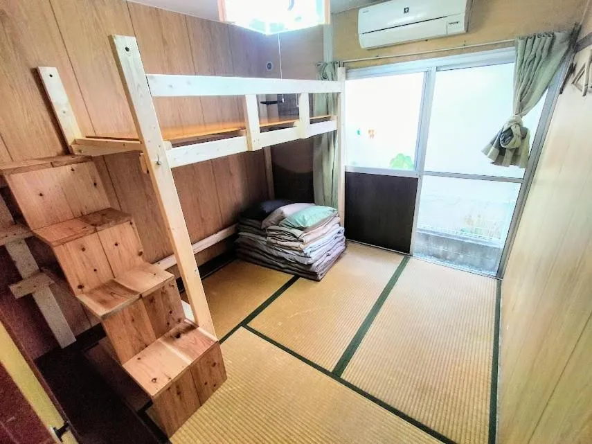 Bed in Minshuku Agaihama