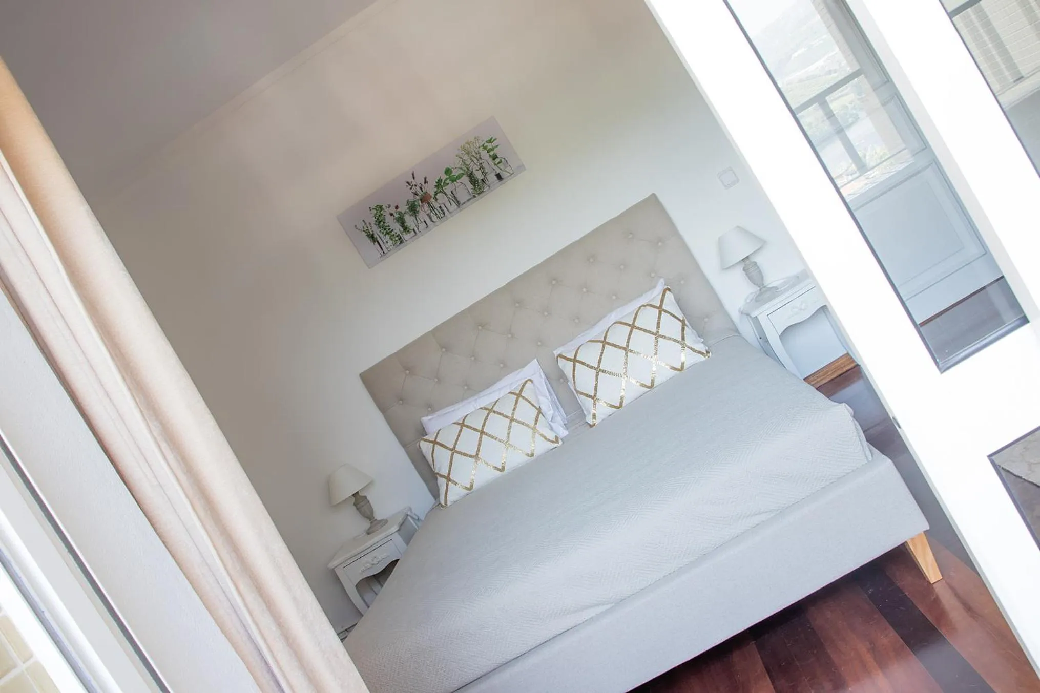 Bed in The Rooftop Suites