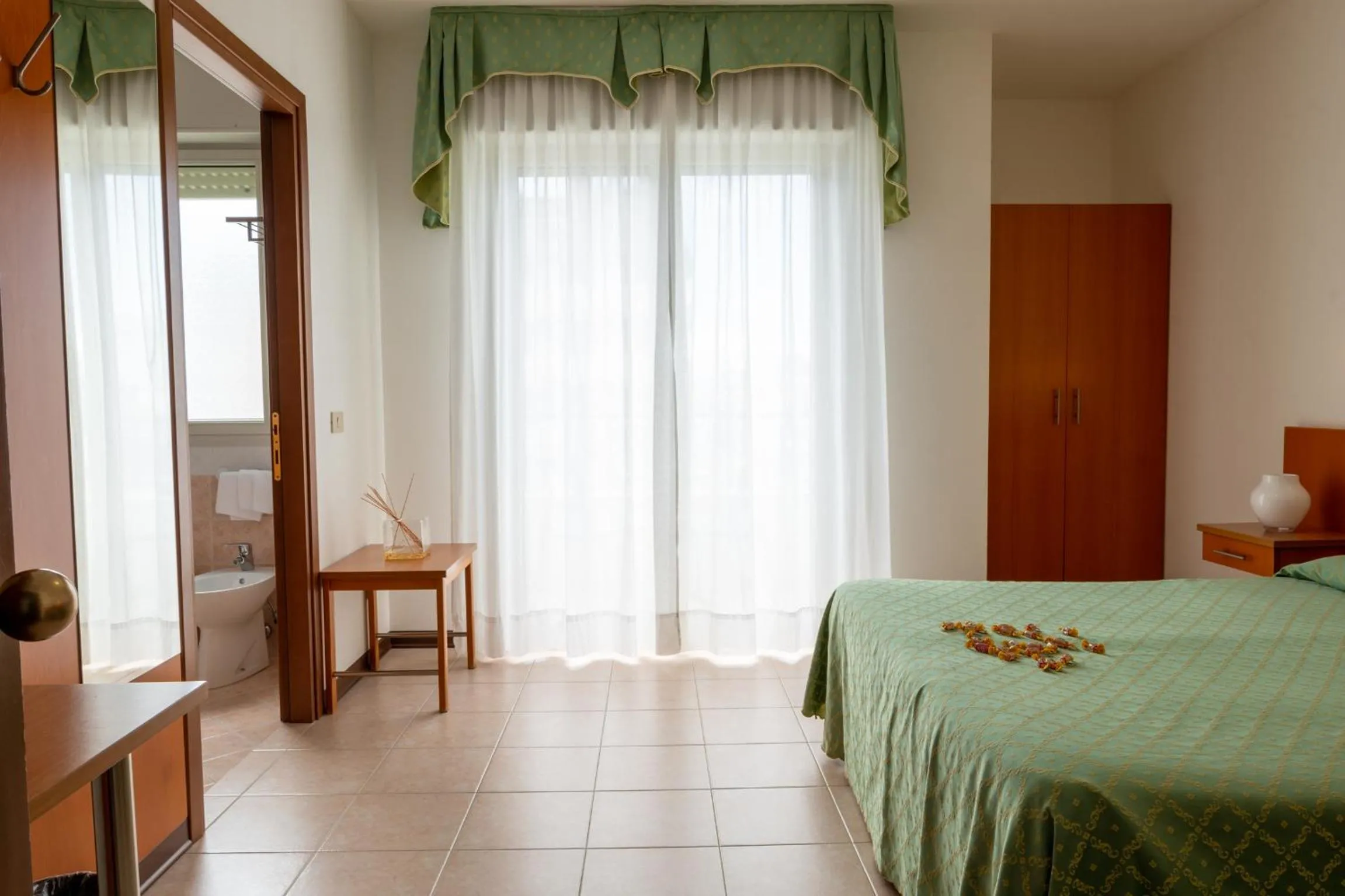Bed in Hotel Nettuno